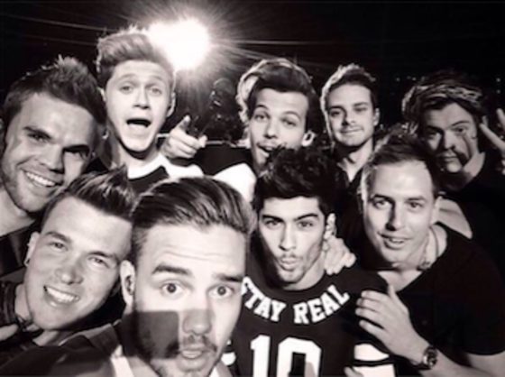 Drummer Josh Devine with One Direction band mates