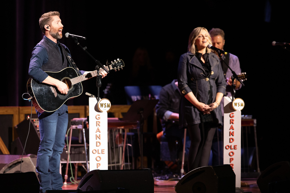 From L to R: Josh Turner with Sonya Issacs Photo courtesy Grand Ole Opry LLC. Chris Hollo, photographer