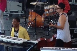 Jon Batiste and Michael Thurber playing at the Newport Jazz Festival, 2015