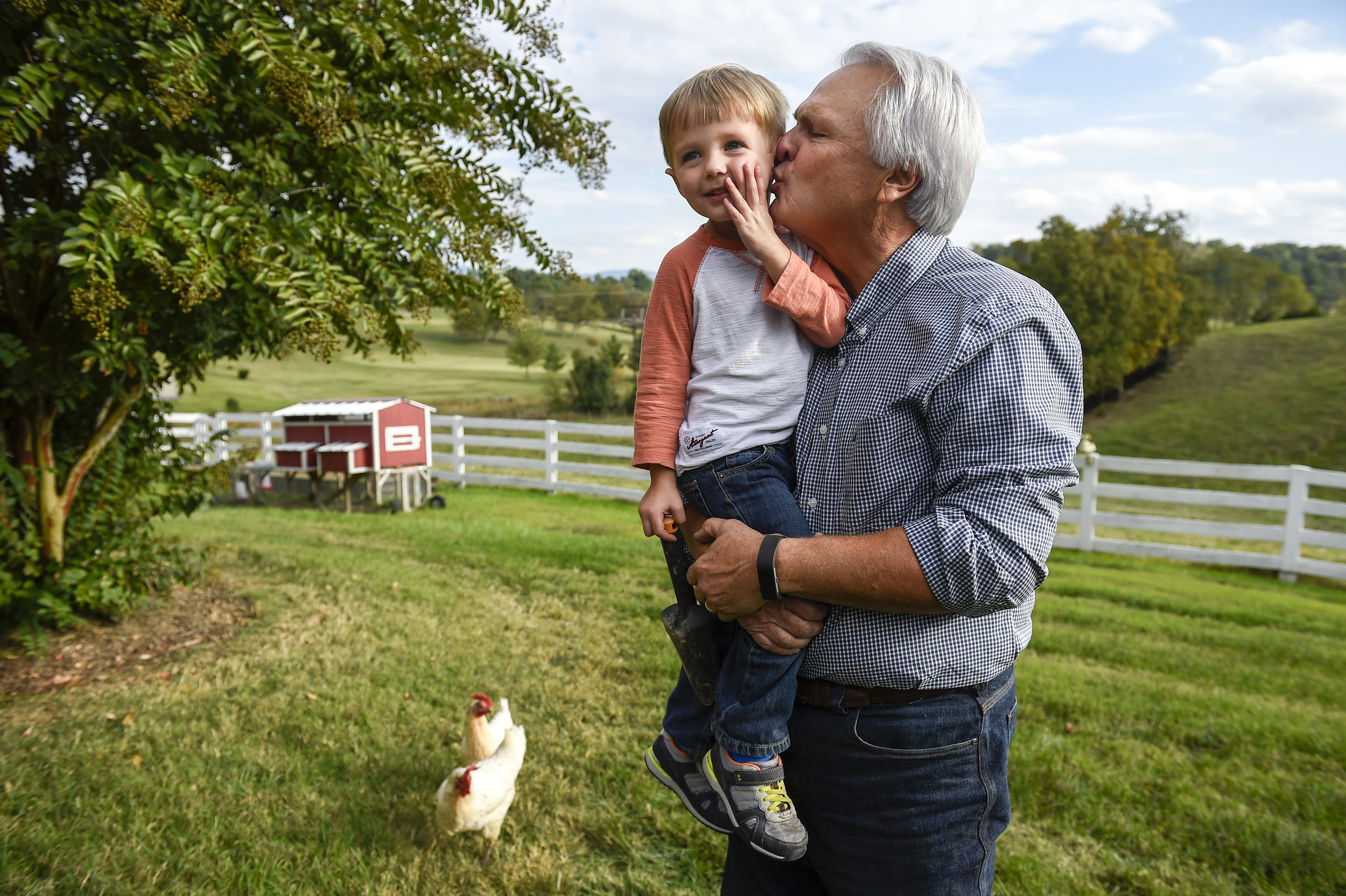  Lt. Gov. Ron Ramsey kisses his 3-year-old grandson, Graham after getting home for work on Friday Oct. 14, 2016, in Blountville, Tenn. 