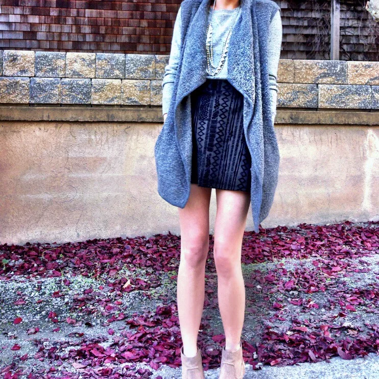 Shop the Look Below: Skirt: Marshall's (old; see similar below.) Top: Gap. Vest: Olivia Sky via Nordstrom Rack. Boots: Dolce Vita. Necklace: Stella & Dot.