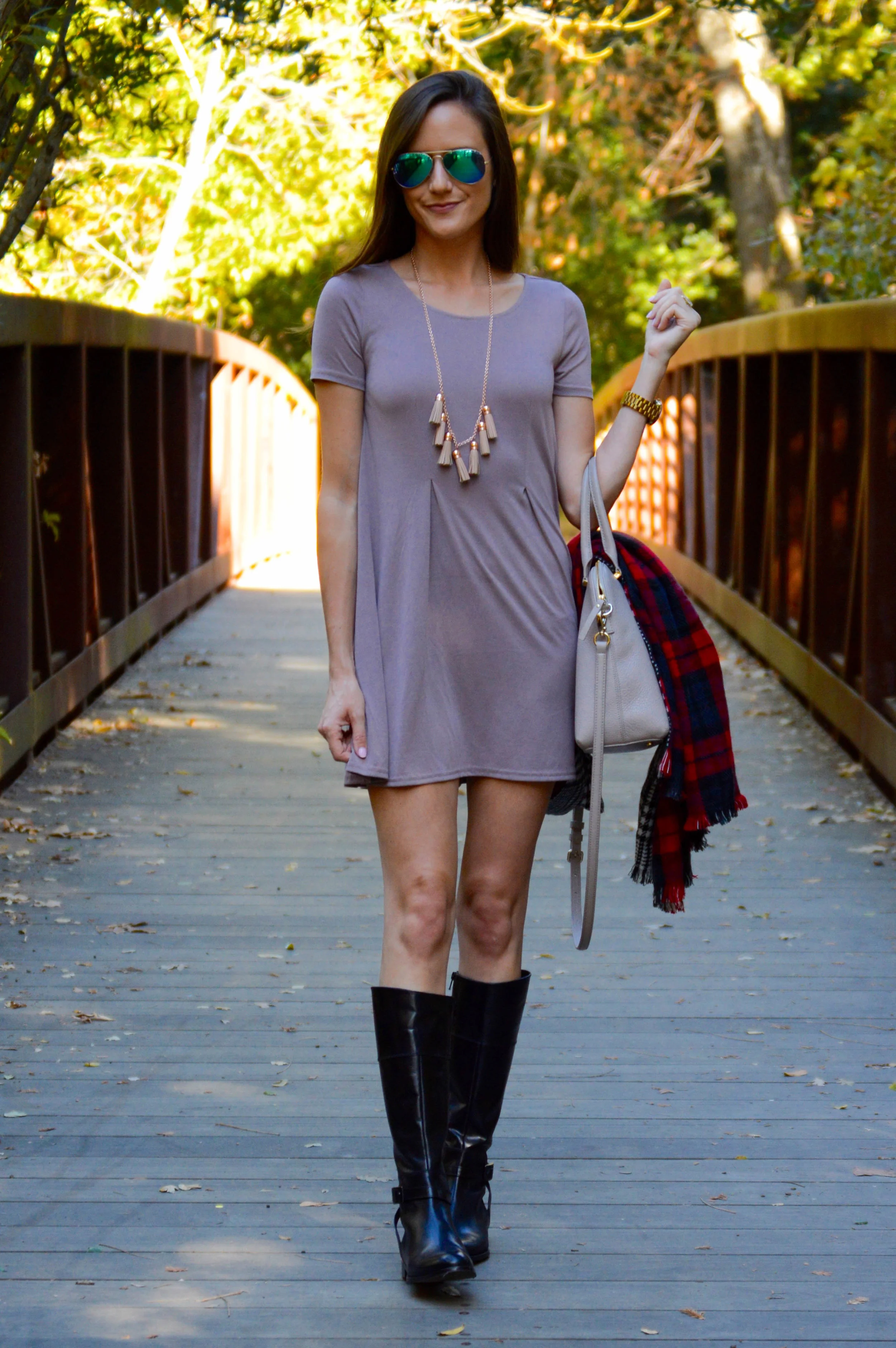 Shop the Look Below. Dress: Urban Outfitters (I own two colors and it's SO comfy1) Boots: c/o Skinnycalf Boots . Bag: Kate Spade . Scarf: I honestly can't remember, but similar here and here . Necklace: BaubleBar . Sunglasses: Off brand. Similar here and here .