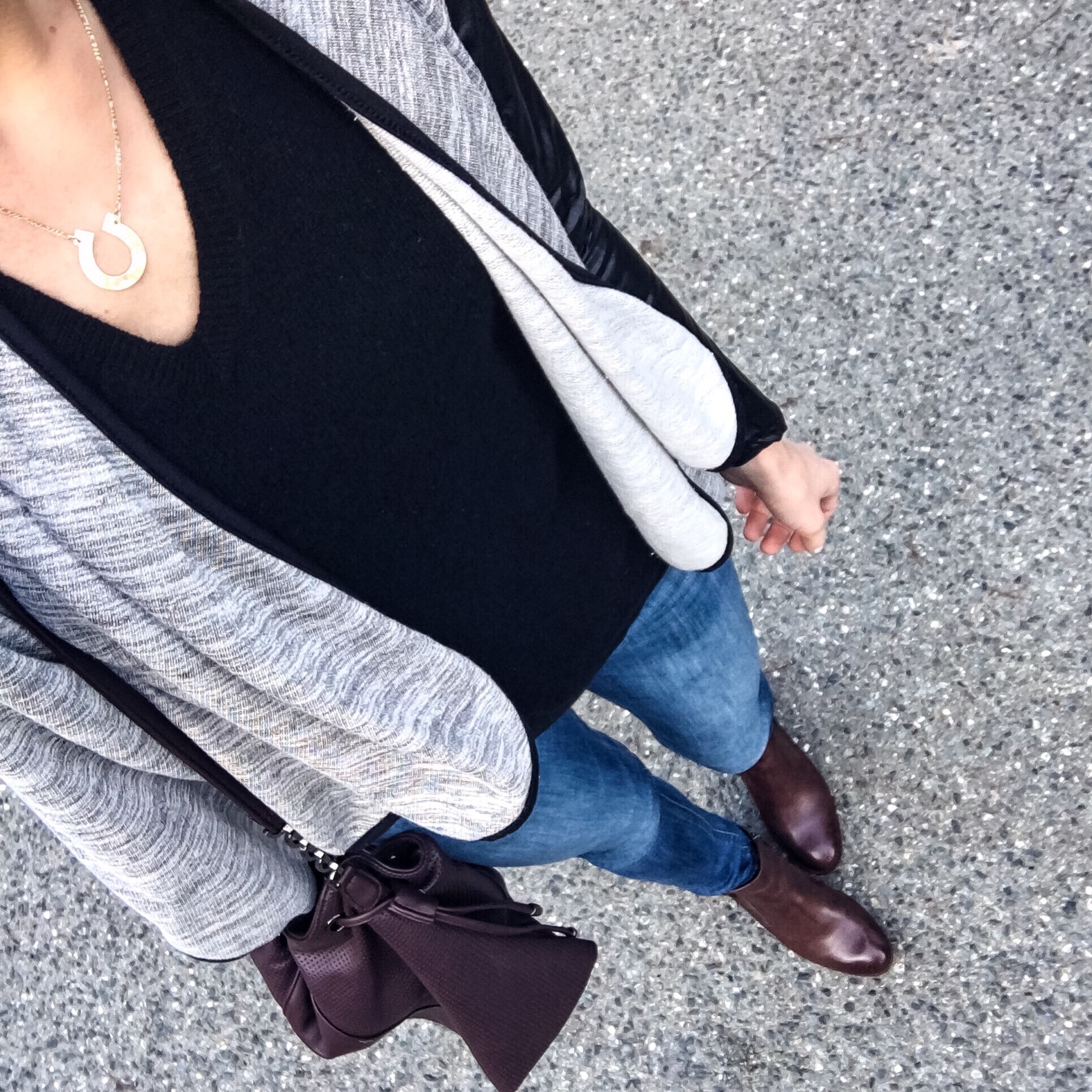 This waterfall cardigan is a great classic with a twist -- the sleeves are faux leather! 