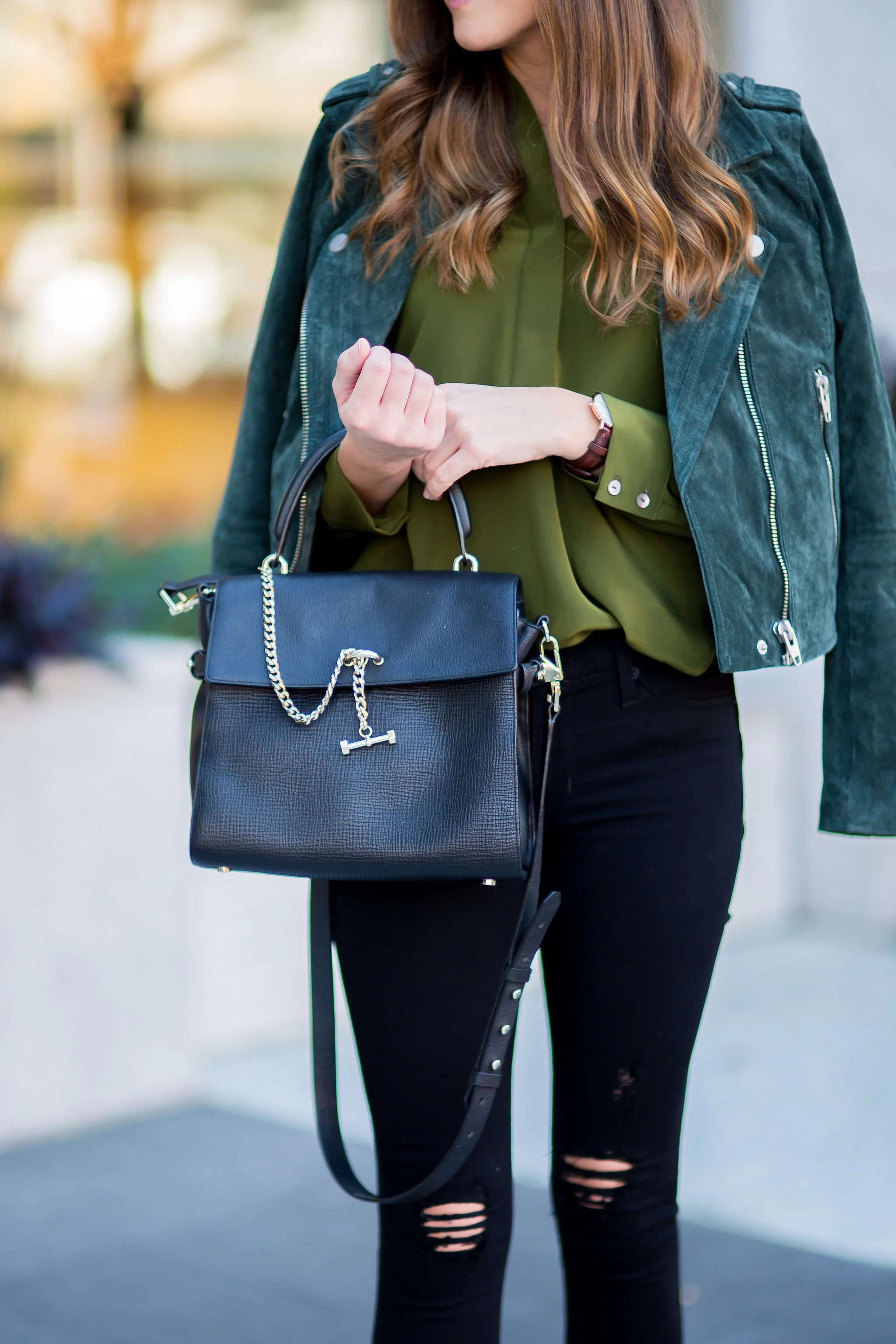 Shop the Look Below. Top: Amour Vert c/o. Jeans. Hudson. Similar here . Jacket: Tj Maxx. Similar here . Booties: Coconuts by Matisse . Bag: Luana Italy c/o. Watch: Daniel Wellington c/o. Photos by Baley Marie Photography