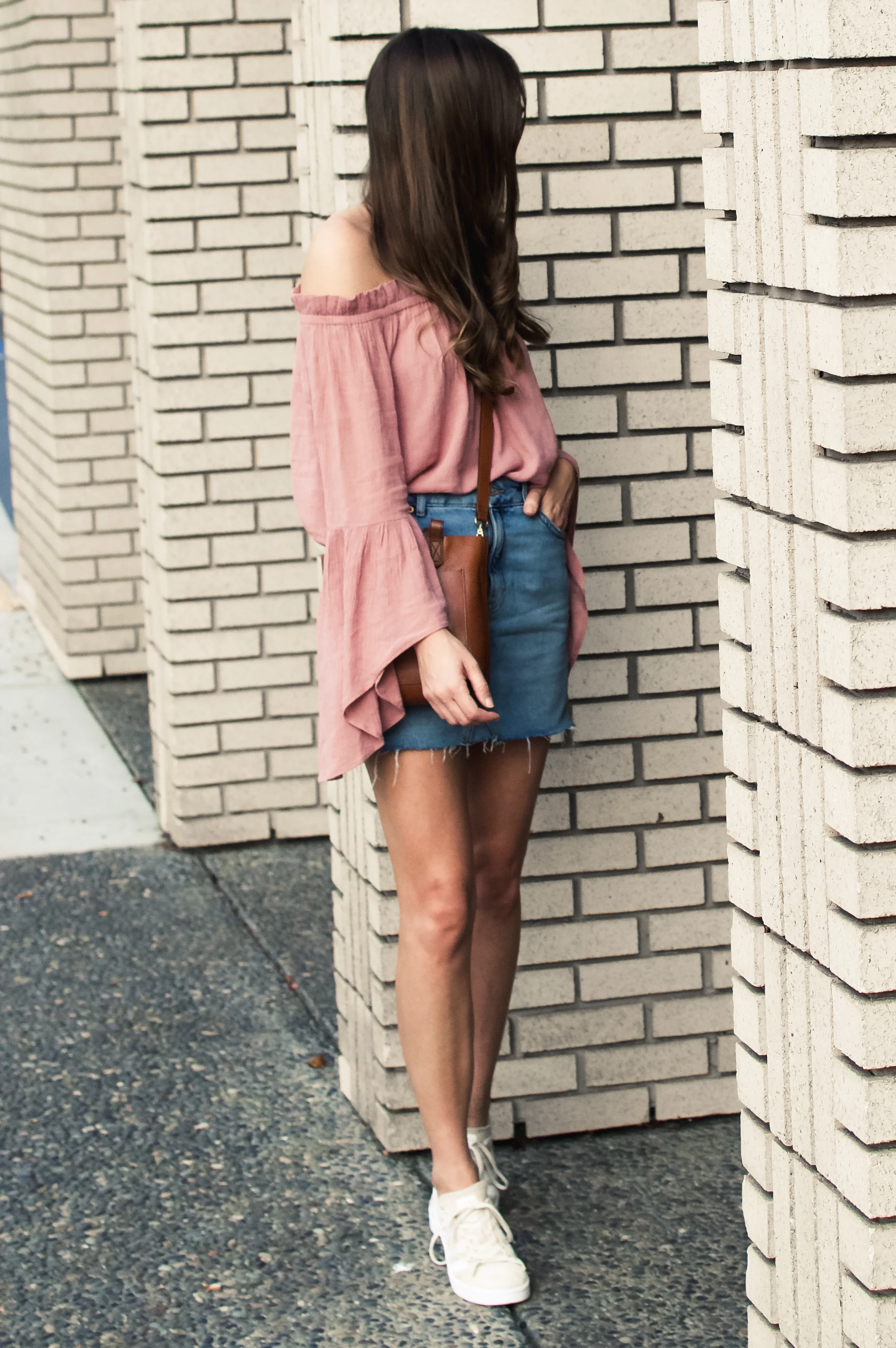 Denim skirt and sneakers