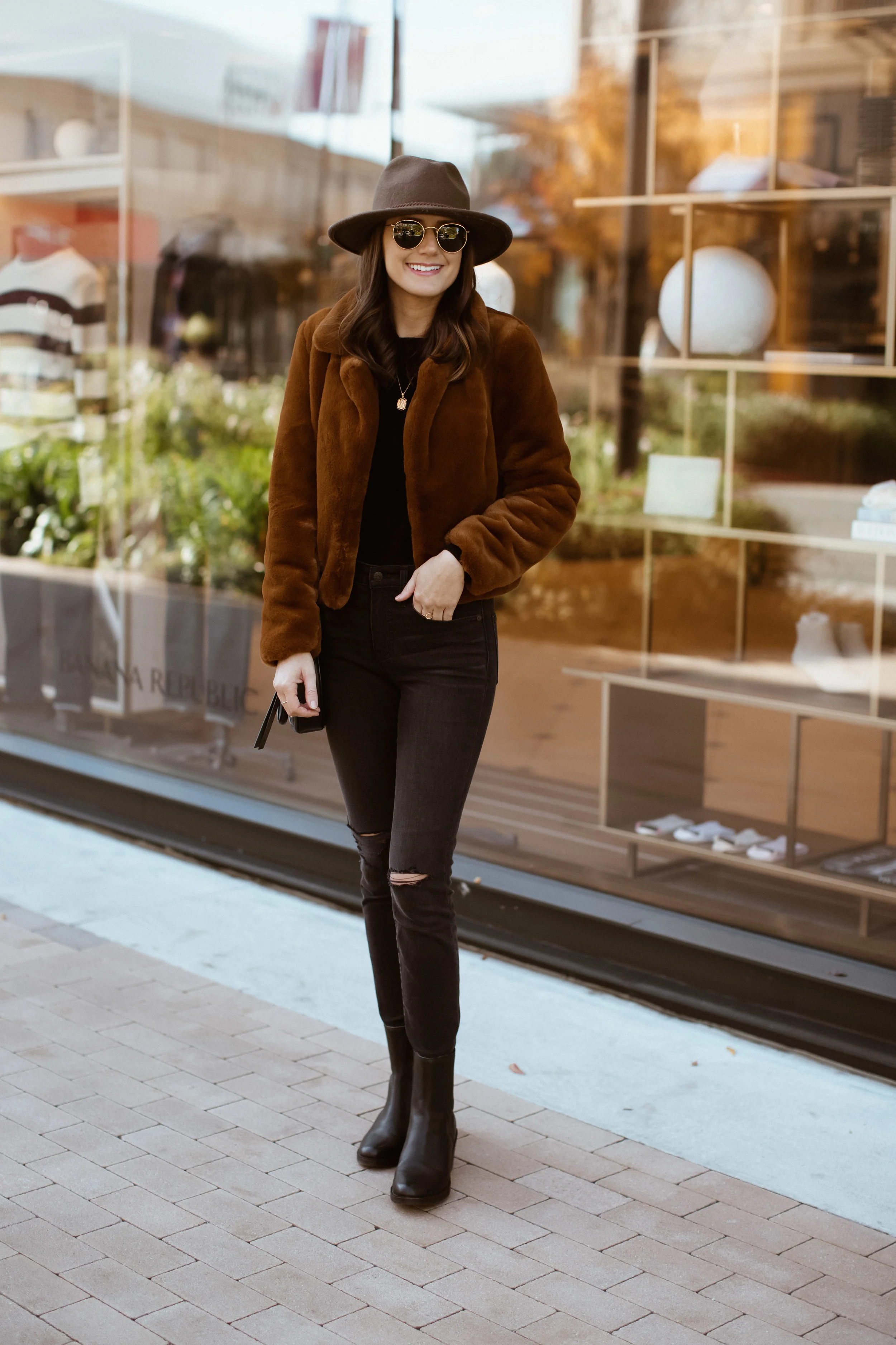 All Black Outfit With Brown Faux Fur Girl Meets Gold