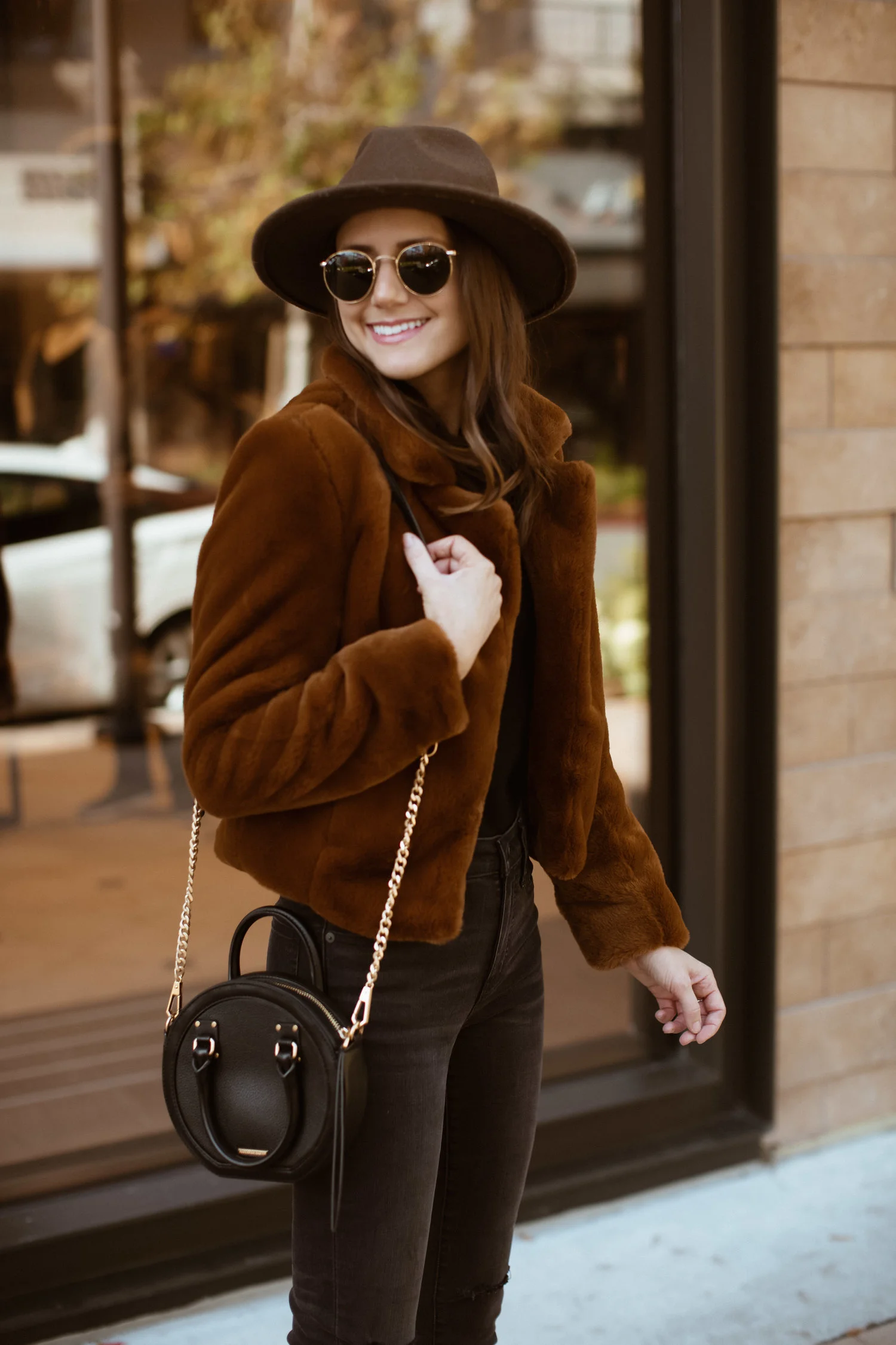 All Black Outfit with Brown Faux Fur