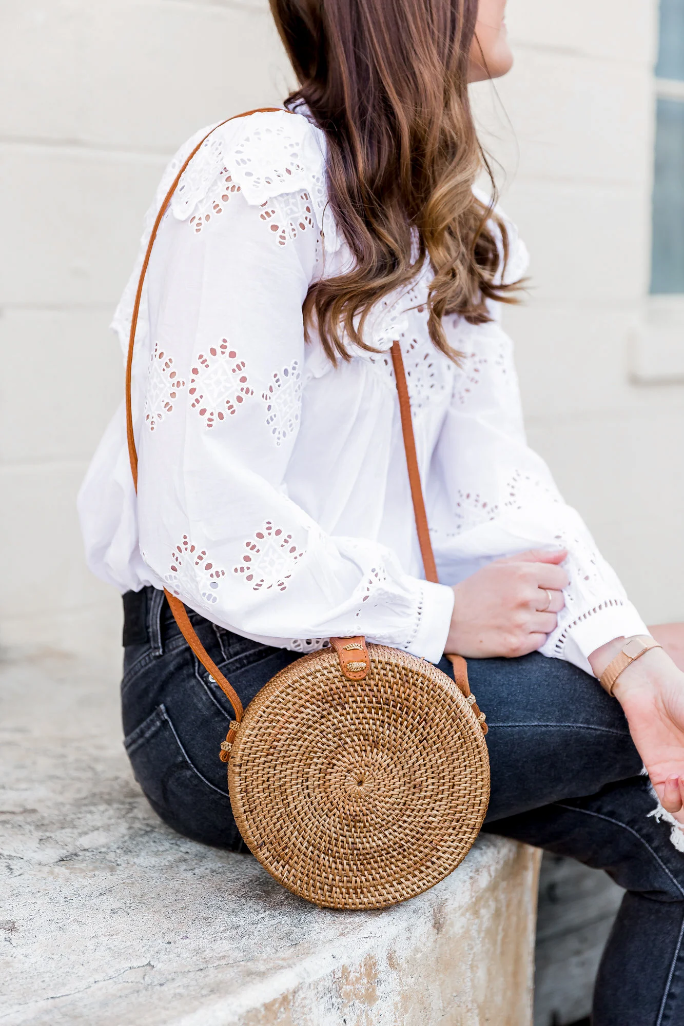 White Ruffle Top and Black Ripped Jeans