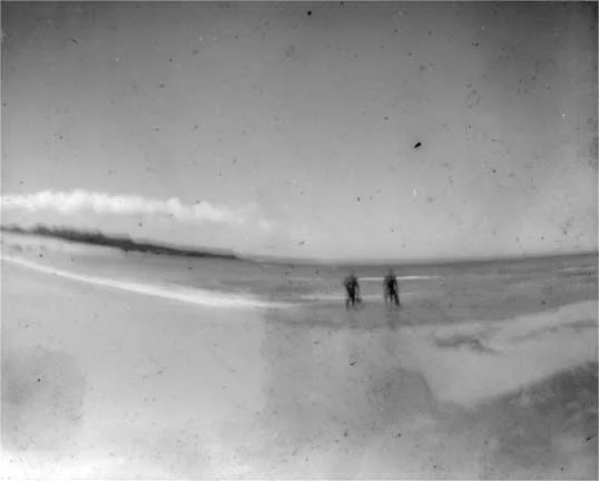 "Divers entering the water, Molokai"