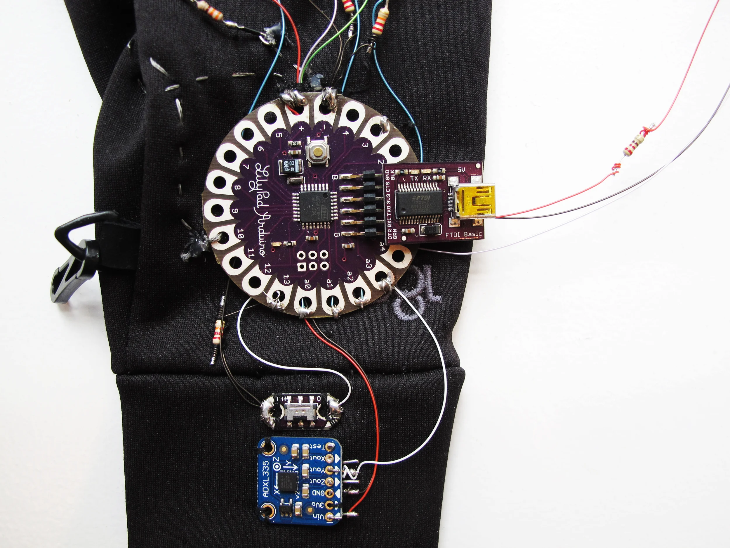 For circuit board, we used the Arduino Lilypad, which is designed for wearables.