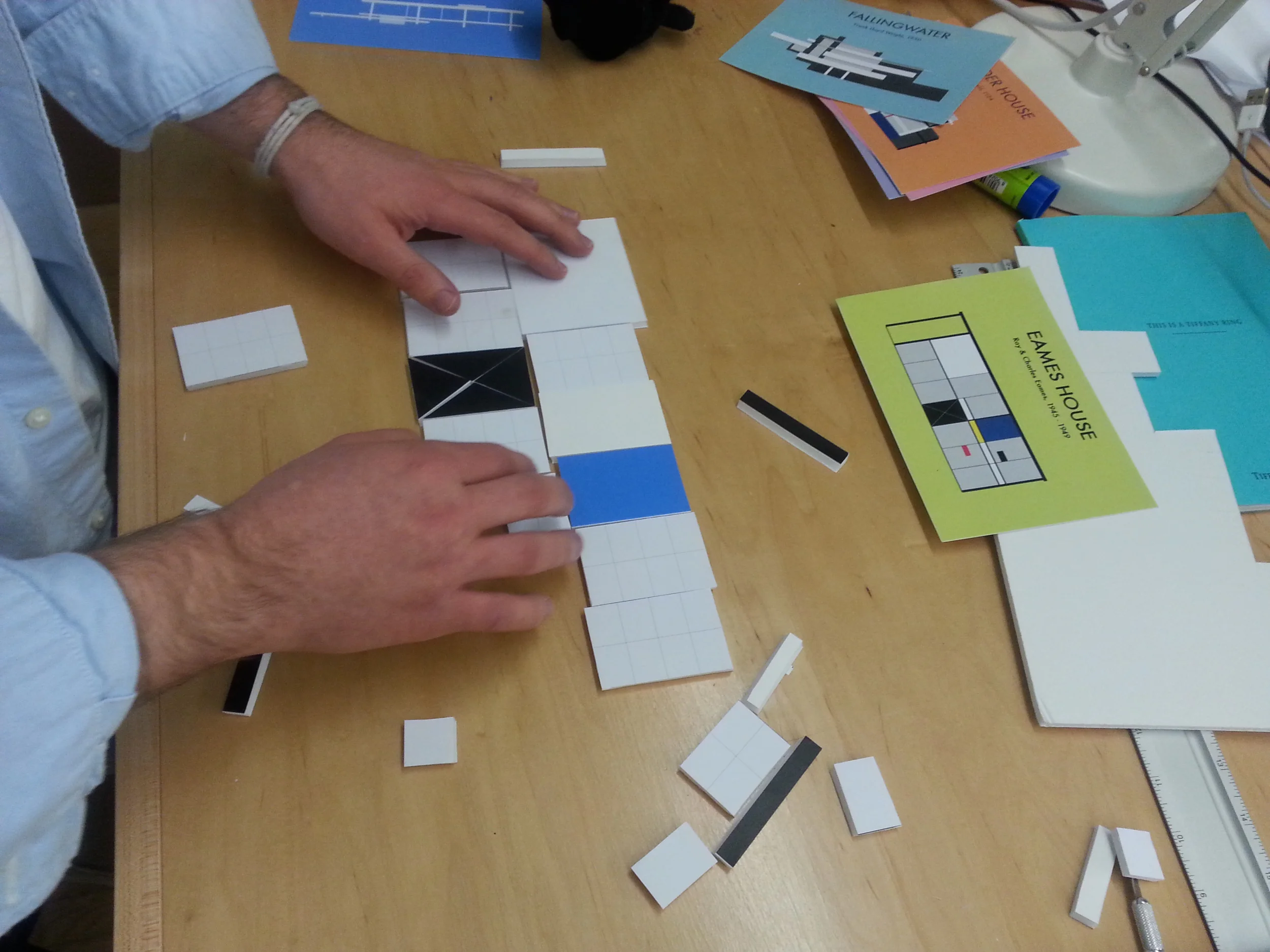 Prototype 2: foam core tangram pieces that assemble to form the buildings illustrated in the flashcard.