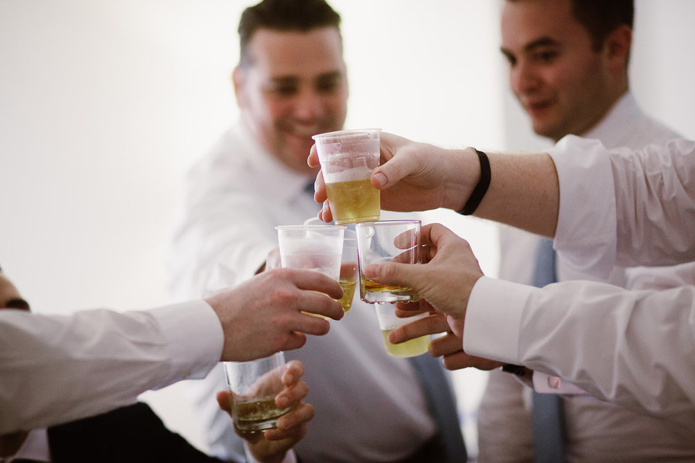  Bride and groom getting ready at the Phoenix Park Hotel, Washington D.C. Irish wedding with green and gold accents. 