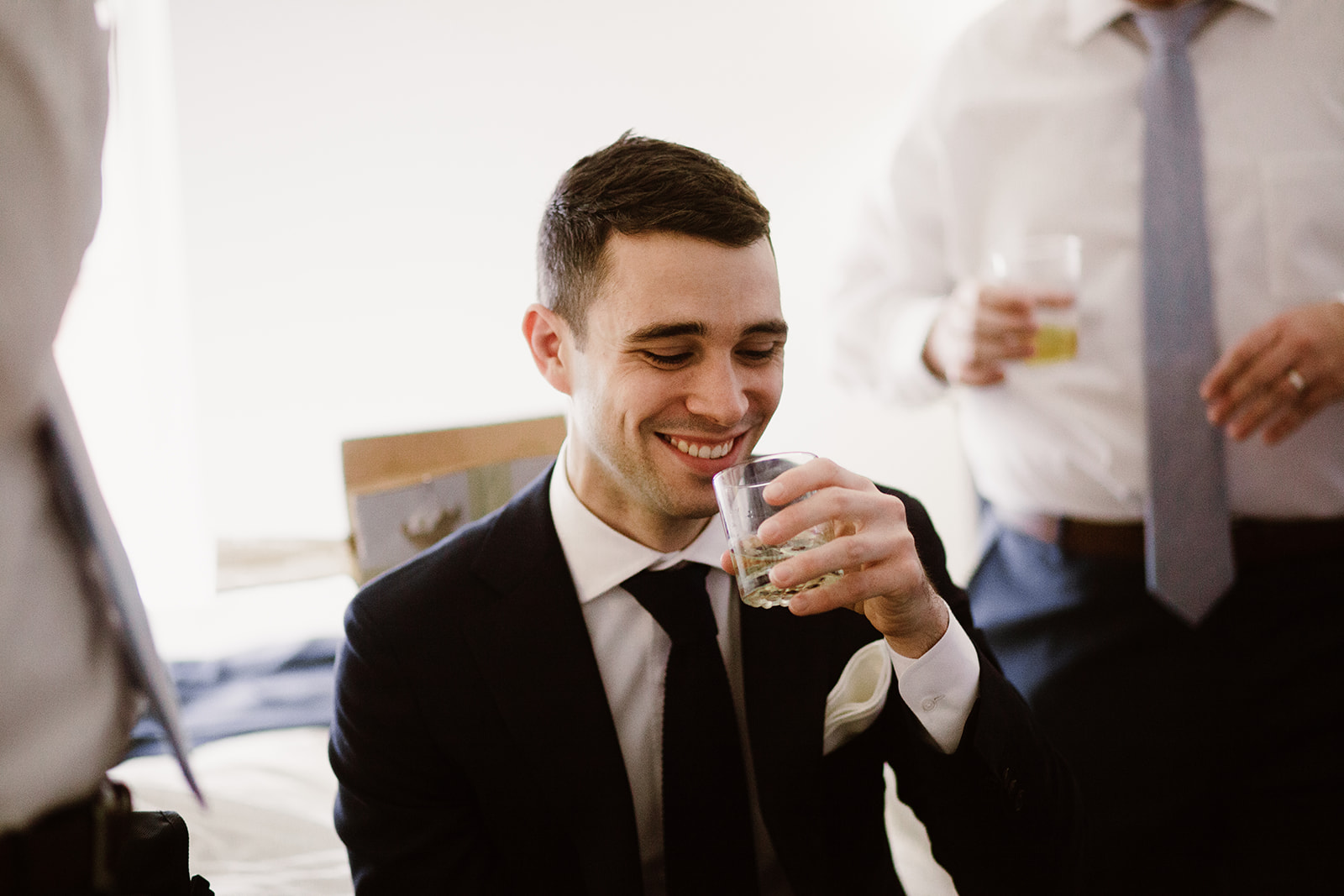  Bride and groom getting ready at the Phoenix Park Hotel, Washington D.C. Irish wedding with green and gold accents. 