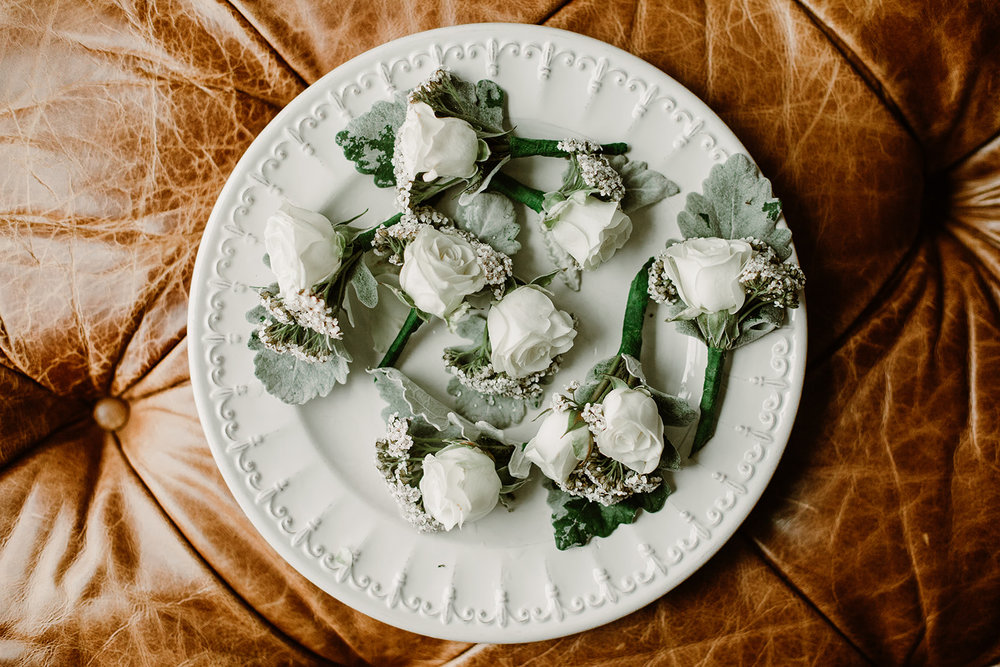  White rose boutonnieres. Bride and groom getting ready at the Phoenix Park Hotel, Washington D.C. Irish wedding with green and gold accents. Sarah Mattozzi Photography. 