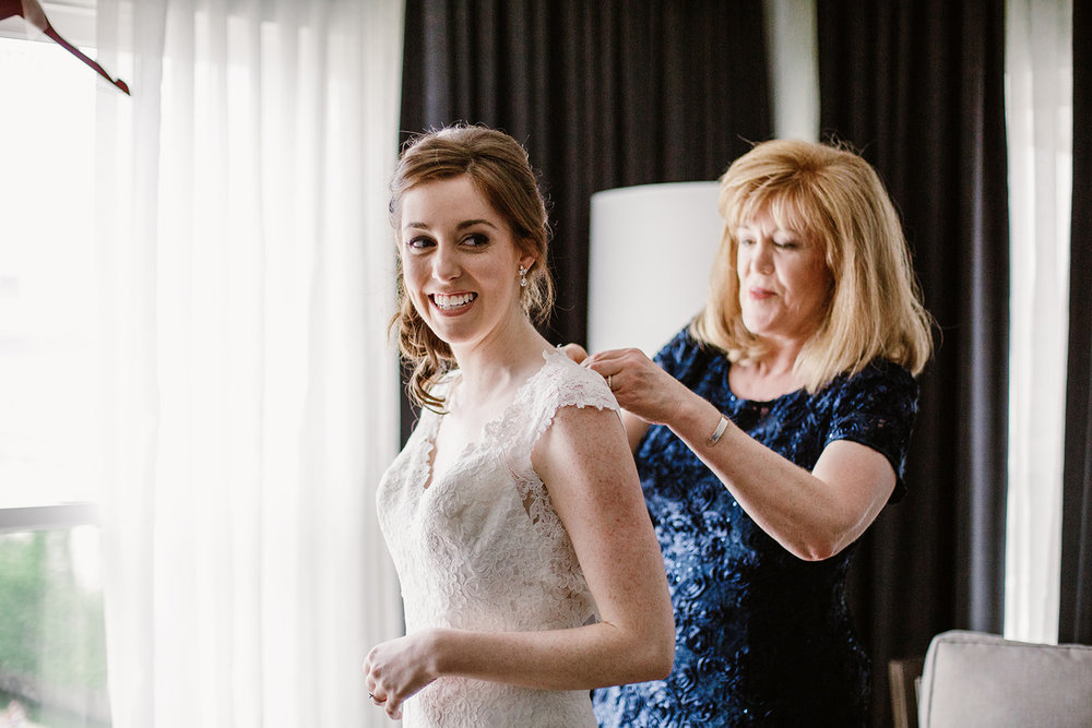  Bride and groom getting ready at the Phoenix Park Hotel, Washington D.C. Irish wedding with green and gold accents. Sarah Mattozzi Photography. 