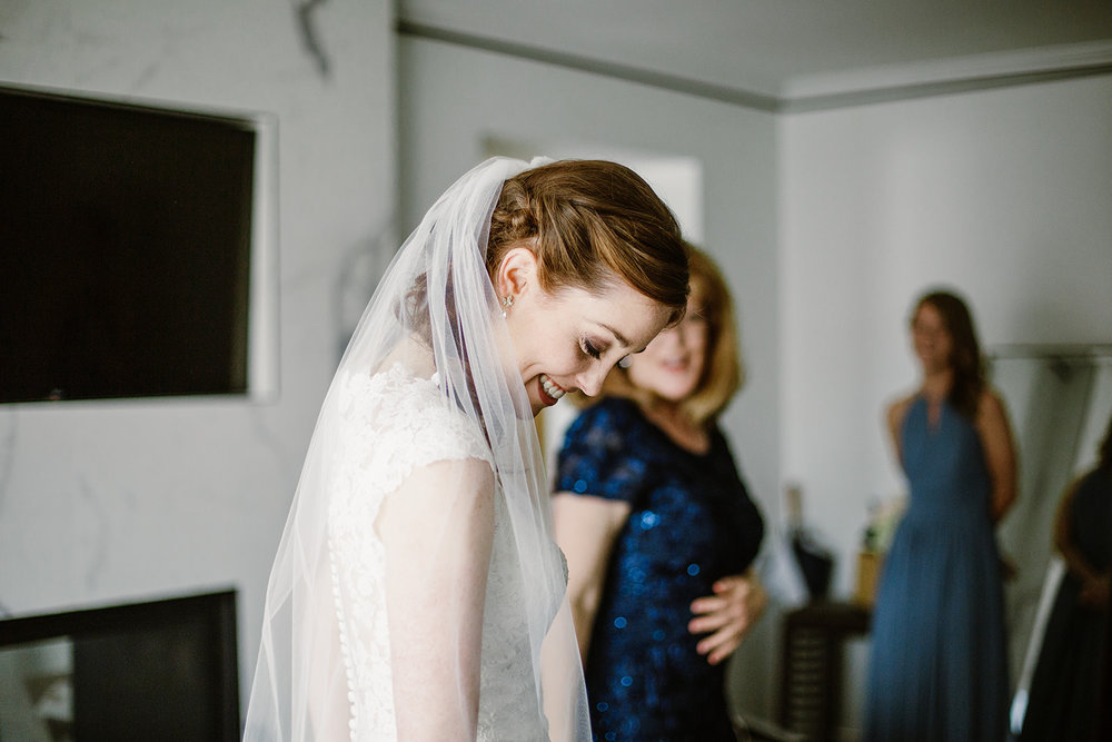  Bride and groom getting ready at the Phoenix Park Hotel, Washington D.C. Irish wedding with green and gold accents. Sarah Mattozzi Photography. 