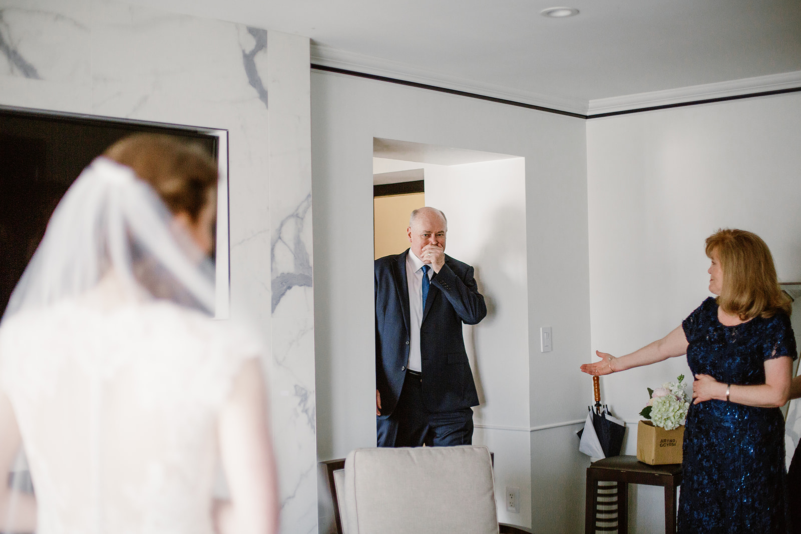  First look with father of the bride. Bride and groom getting ready at the Phoenix Park Hotel, Washington D.C. Irish wedding with green and gold accents. Sarah Mattozzi Photography. 