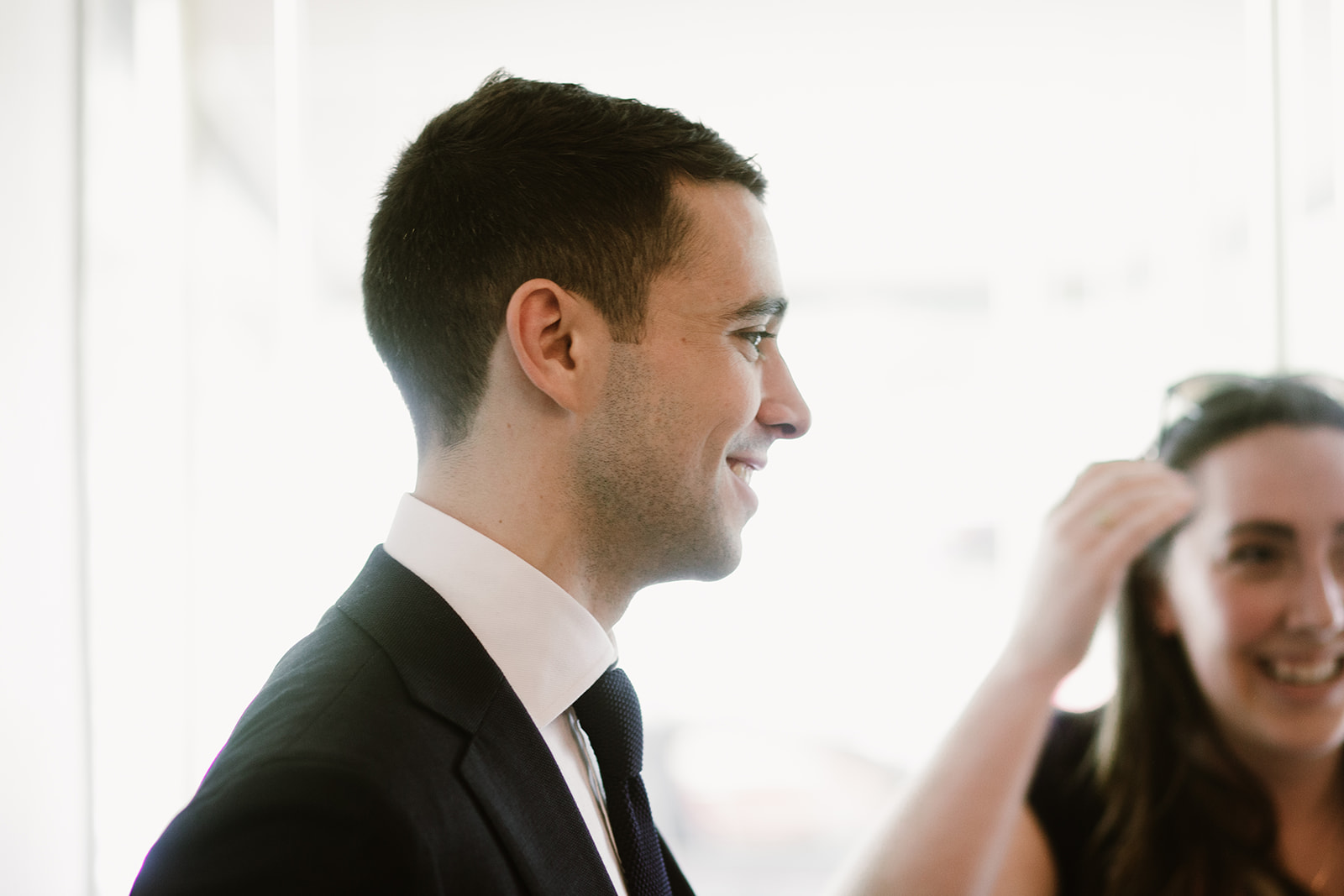  Bride and groom getting ready at the Phoenix Park Hotel, Washington D.C. Irish wedding with green and gold accents. Sarah Mattozzi Photography. 