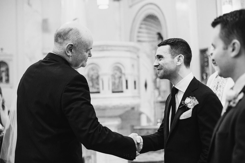  Wedding ceremony at Holy Rosary Church, Washington D.C. Irish wedding with green and gold accents. Sarah Mattozzi Photography. 