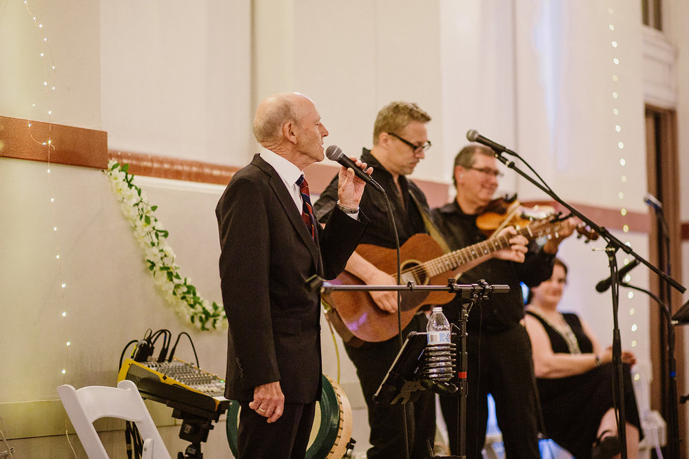  Wedding reception at Eastern Market in Washington D.C. Irish wedding with green and gold accents. Sarah Mattozzi Photography. 