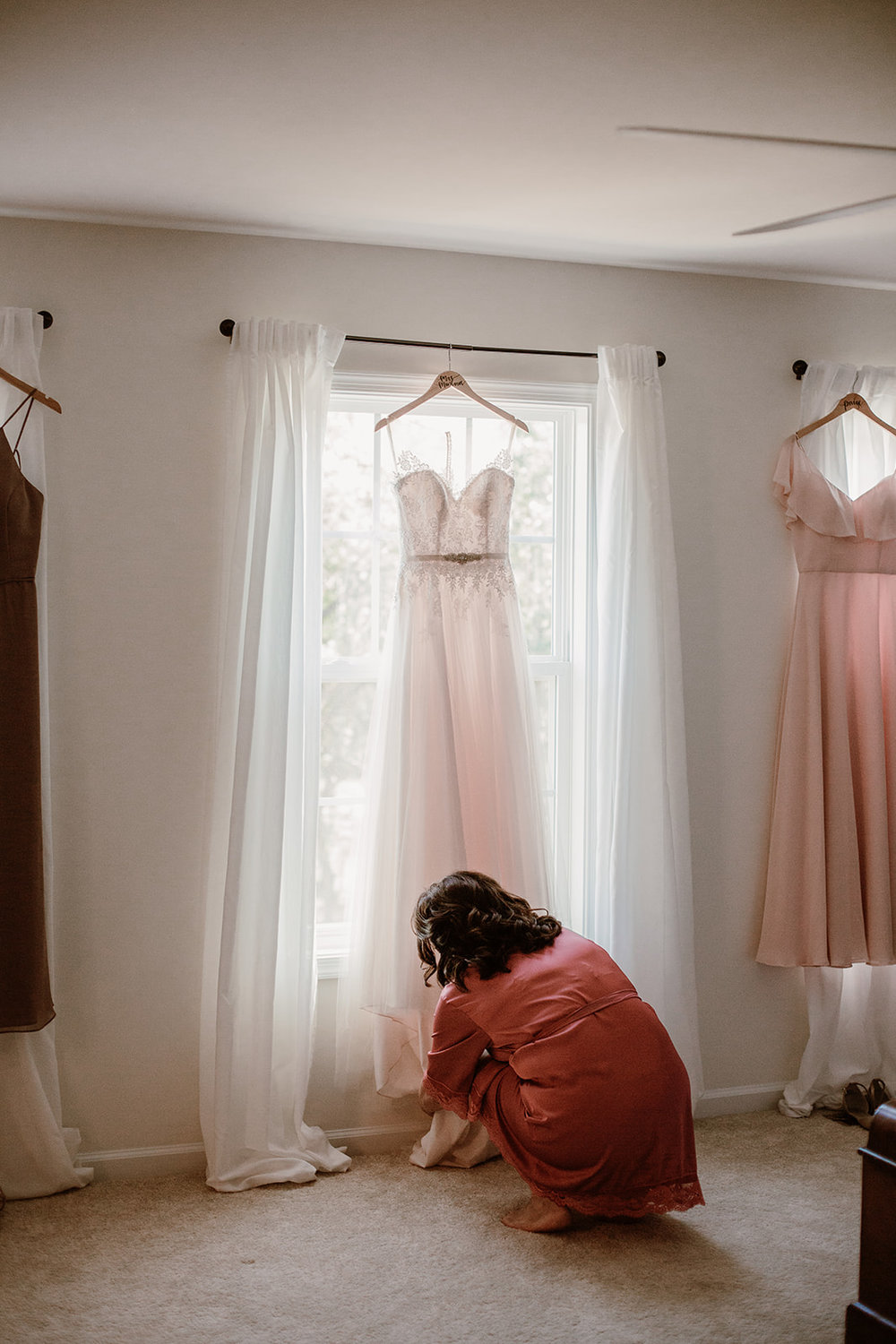  Dress hanging in the window | Intimate Wedding | Fredericksburg, VA | Sarah Mattozzi Photography 