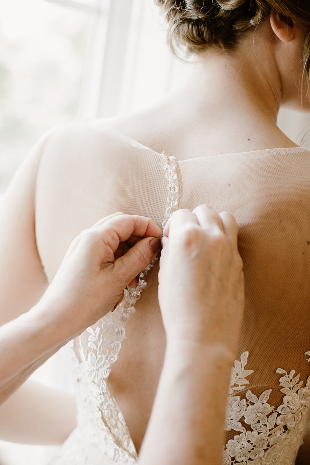  Buttoning up the wedding dress | Intimate Wedding | Fredericksburg, VA | Sarah Mattozzi Photography 