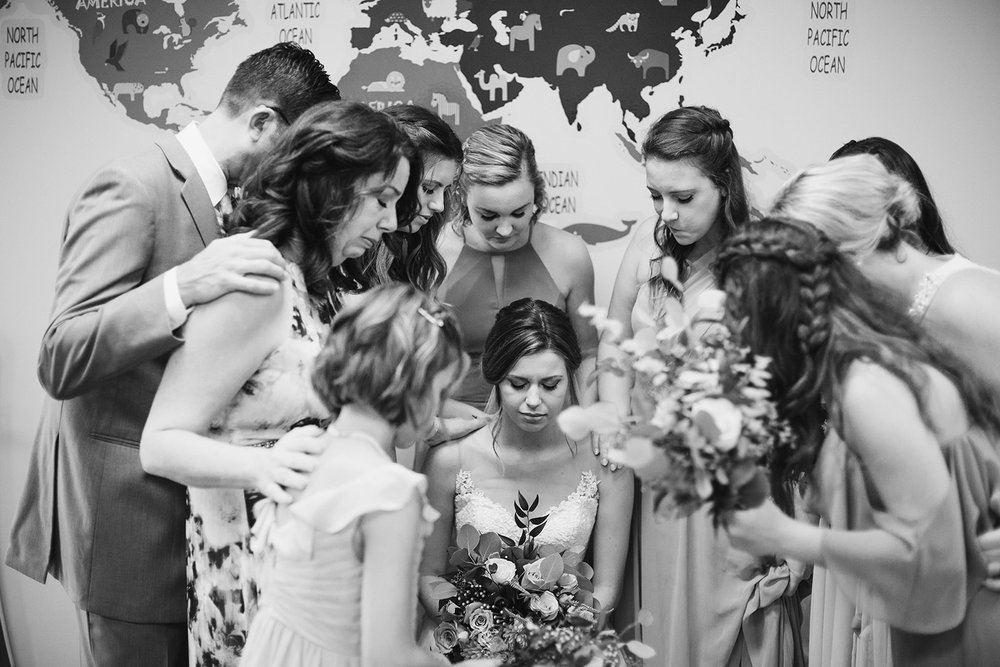  Bridesmaids praying over bride | Intimate Wedding | Fredericksburg, VA | Sarah Mattozzi Photography 