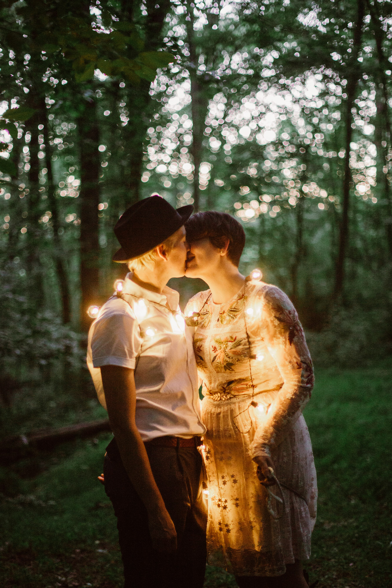  Adventurous woodland elopement in Charlottesville, VA with only the couple and their dachshund dogs. Embroidered wedding dress, wildflower inspired bouquet, and handwritten vows. Sarah Mattozzi Photography. 