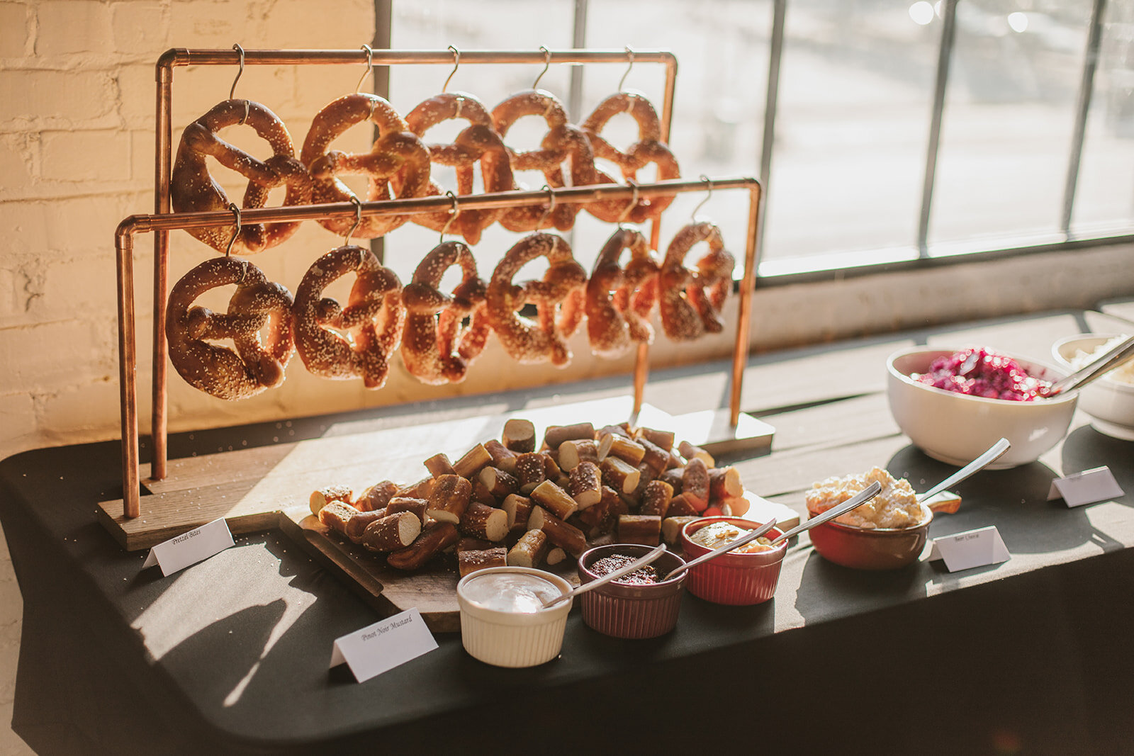  Pretzel buffet. Modern rooftop wedding at The Hofheimer Building, Richmond, VA 