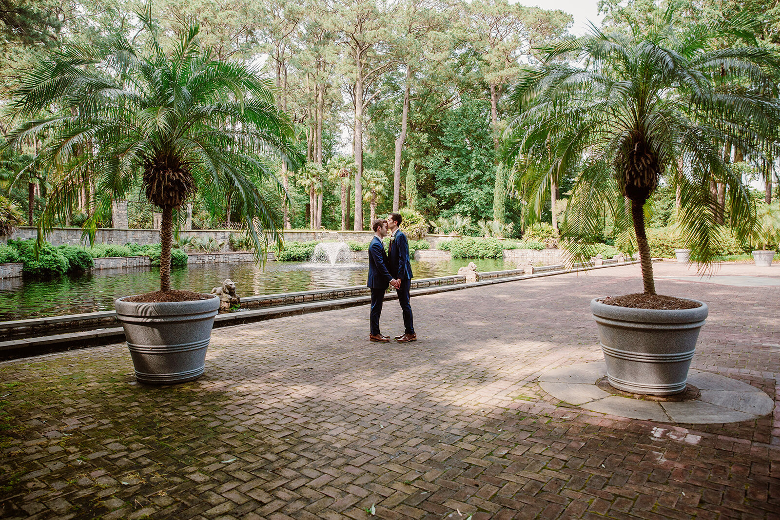  Portraits of the grooms. Vegan wedding at the Norfolk Botanical Gardens, Norfolk, VA. Rose garden and plant inspired wedding on the first day of Pride month. Sarah Mattozzi Photography. 