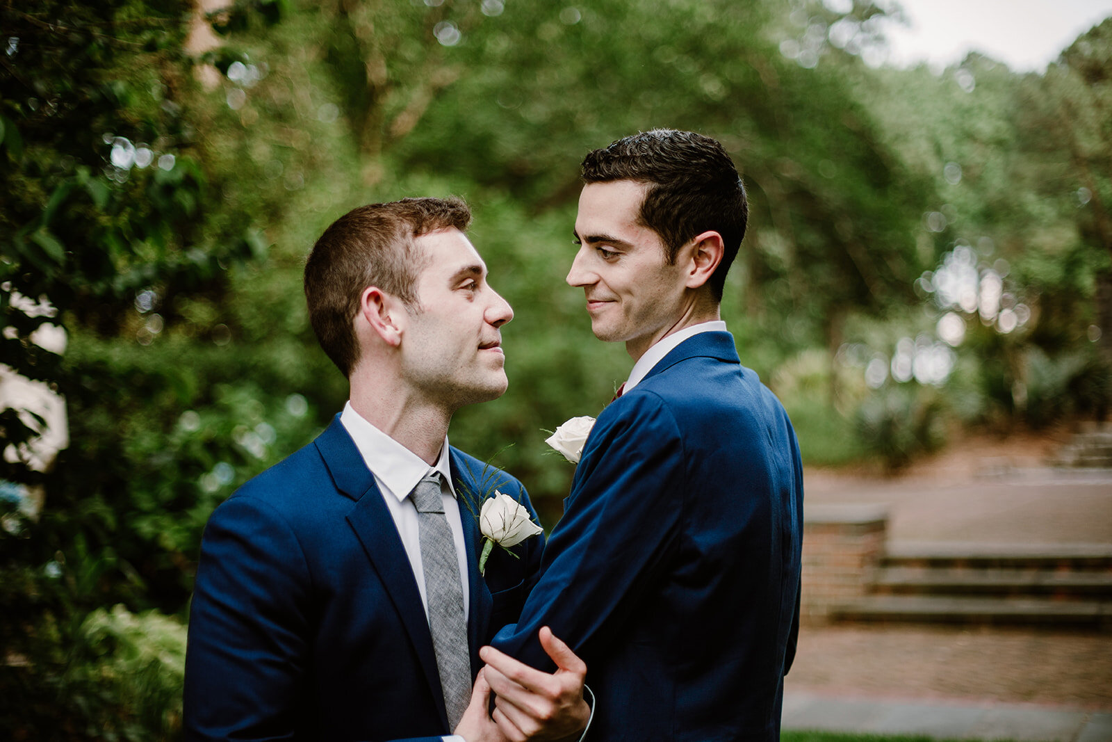  Portraits of the grooms. Vegan wedding at the Norfolk Botanical Gardens, Norfolk, VA. Rose garden and plant inspired wedding on the first day of Pride month. Sarah Mattozzi Photography. 