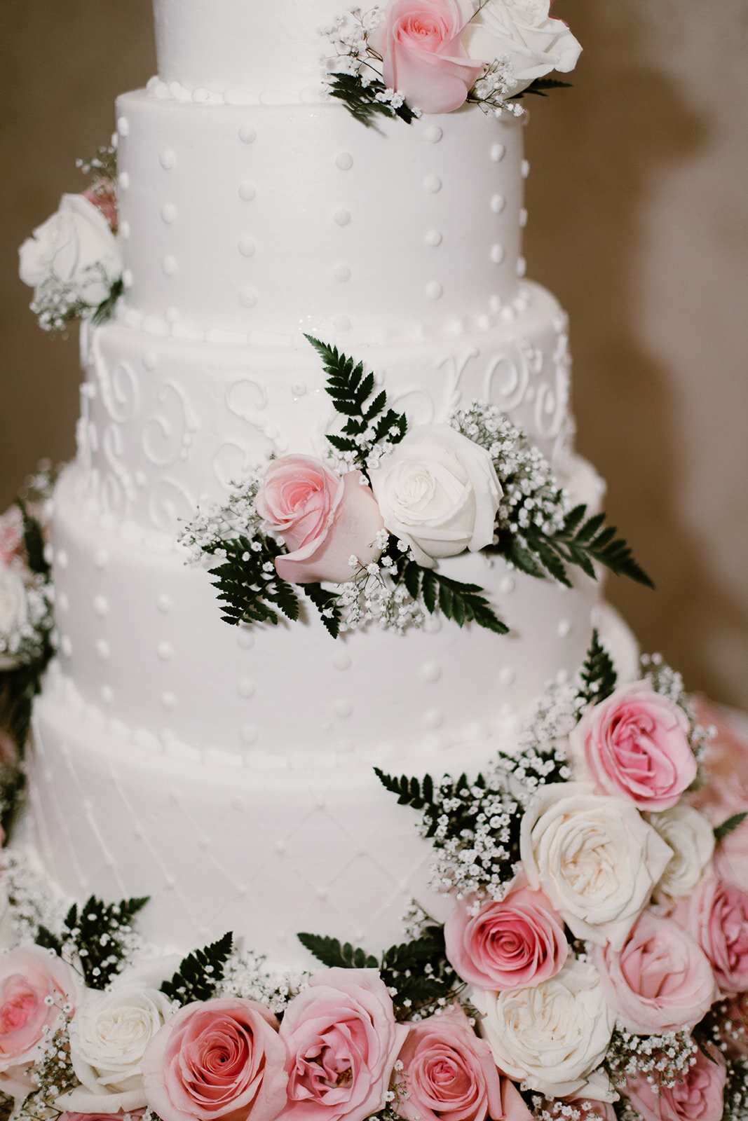  Pink rose tiered wedding cake. Vegan wedding at the Norfolk Botanical Gardens, Norfolk, VA. Rose garden and plant inspired wedding on the first day of Pride month. Sarah Mattozzi Photography. 