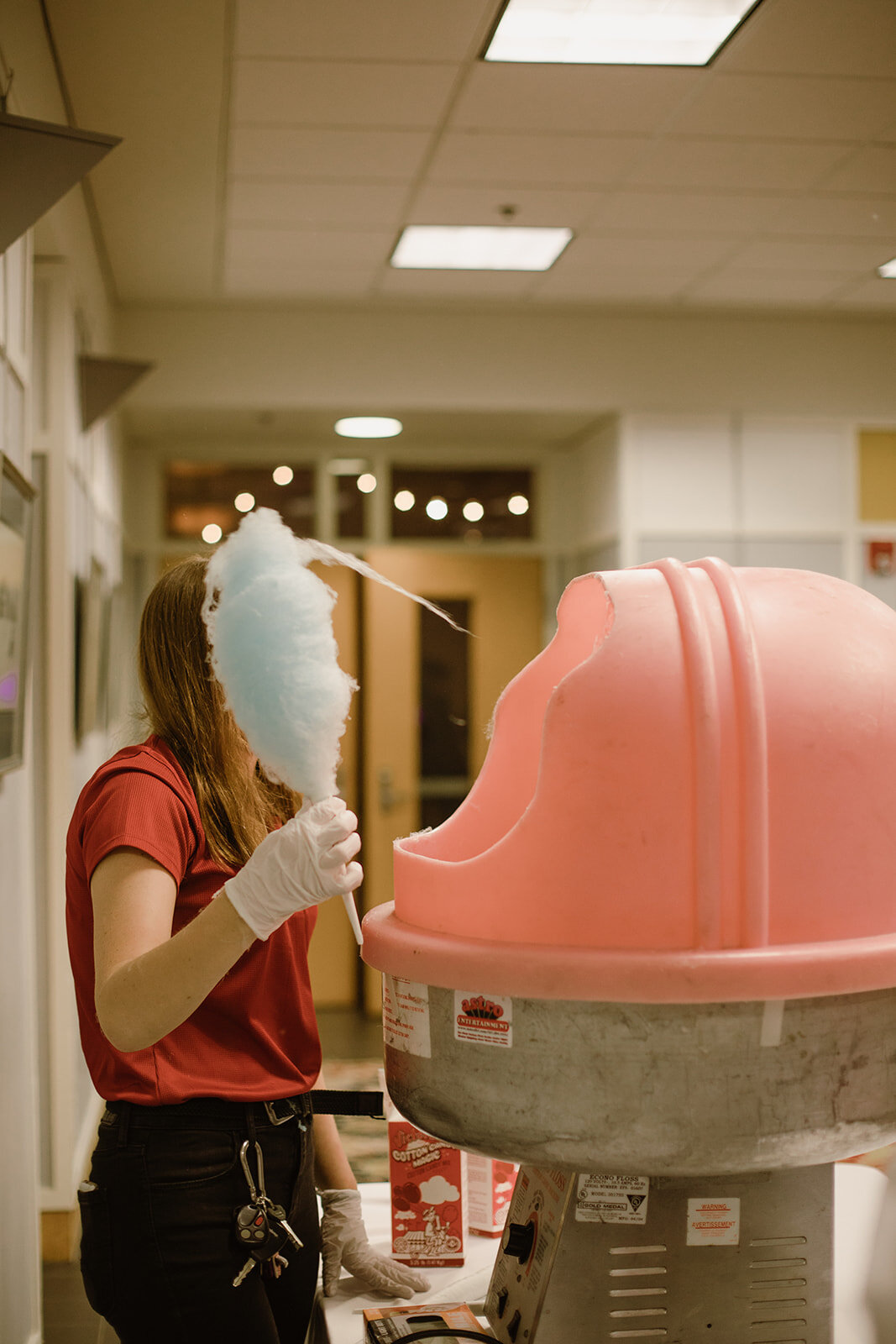  Cotton candy machine at the wedding reception. Vegan wedding at the Norfolk Botanical Gardens, Norfolk, VA. Rose garden and plant inspired wedding on the first day of Pride month. Sarah Mattozzi Photography. 