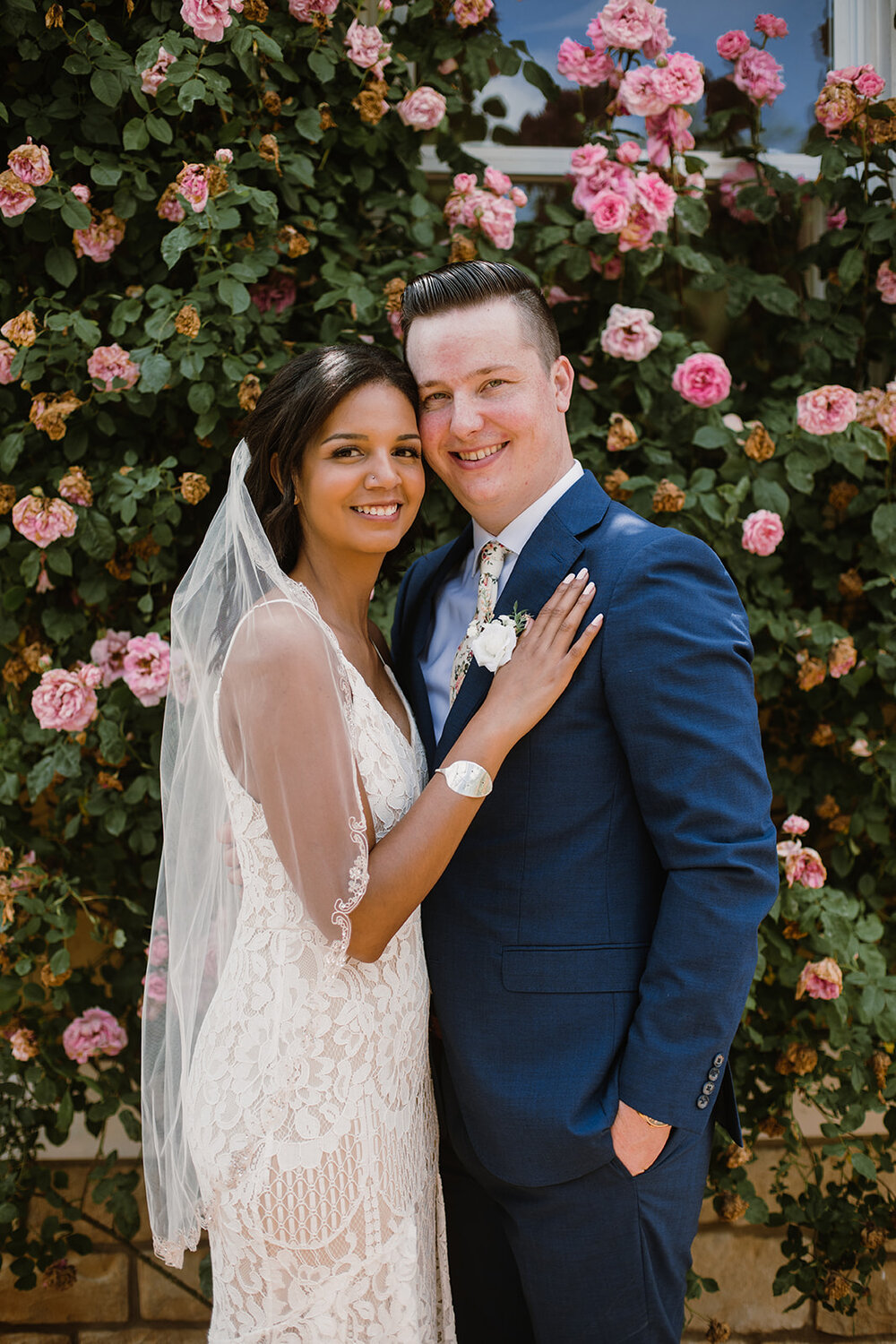  Bride and groom portraits with climbing roses in a garden. Intimate Italian villa elopement at Monteventoso in Madison, Virginia. 