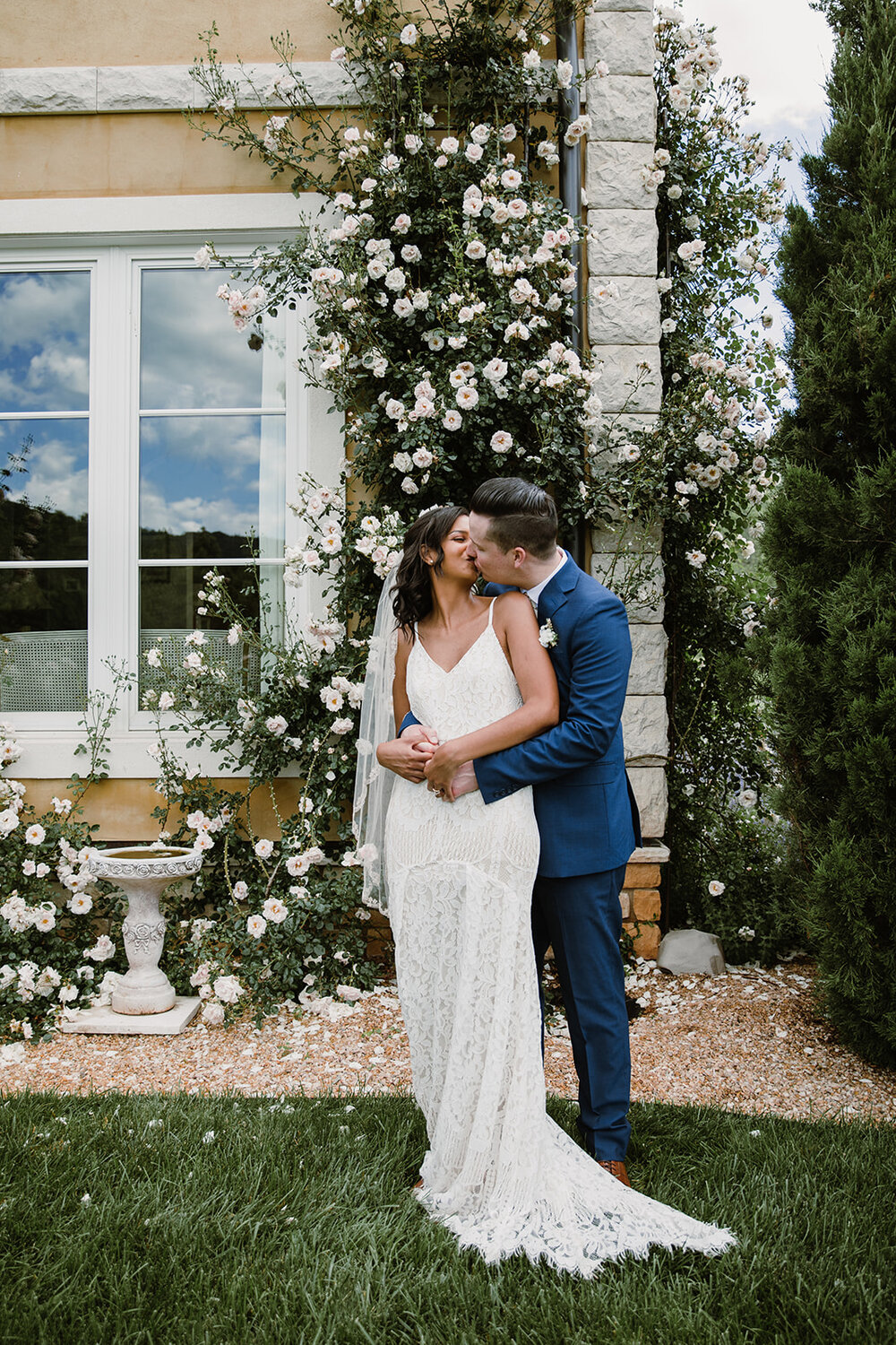  Bride and groom portraits with climbing roses in a garden. Intimate Italian villa elopement at Monteventoso in Madison, Virginia. 