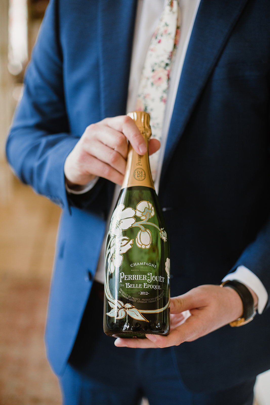  Bottle of Perrier-Jouet Belle Epoque Brut 2012 champagne. Intimate Italian villa elopement at Monteventoso in Madison, Virginia. 