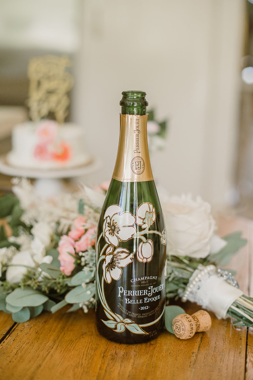  Bottle of Perrier-Jouet Belle Epoque Brut 2012 champagne. Intimate Italian villa elopement at Monteventoso in Madison, Virginia. 
