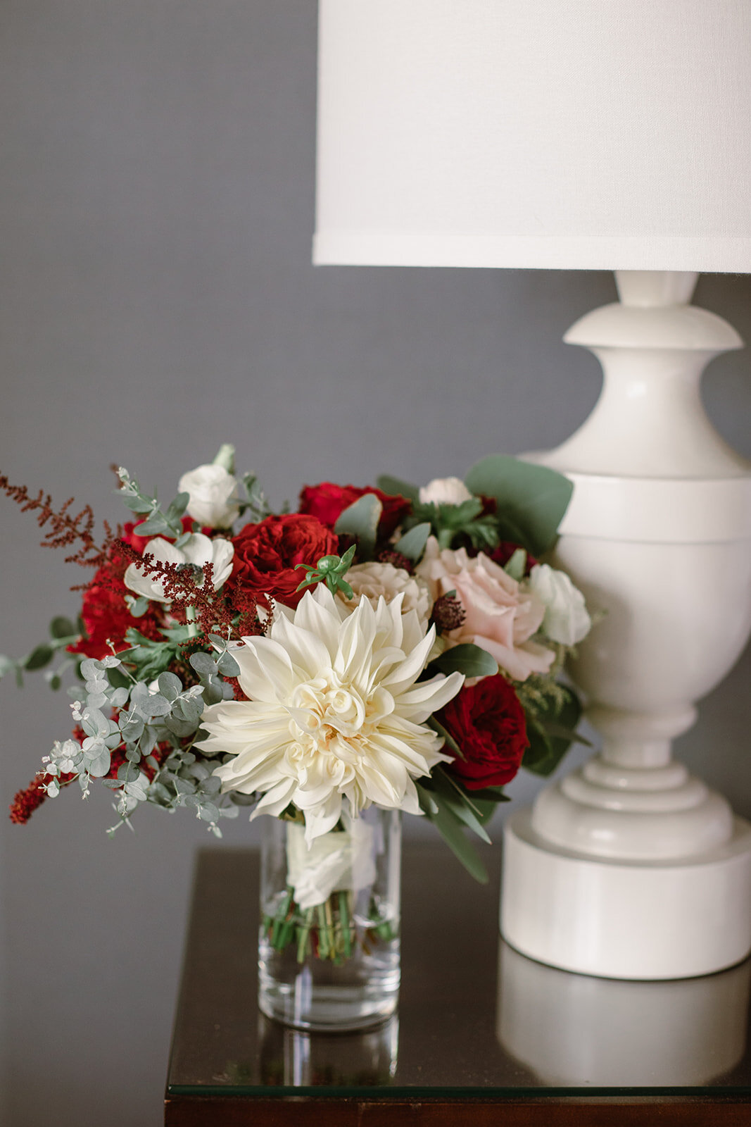 Cafe au lait dahlias and red peony wedding florals | Black tie wedding with a red tux and custom Anne Barge gown | Romantic wedding at St. Bridget and The Omni Hotel in Richmond, VA.