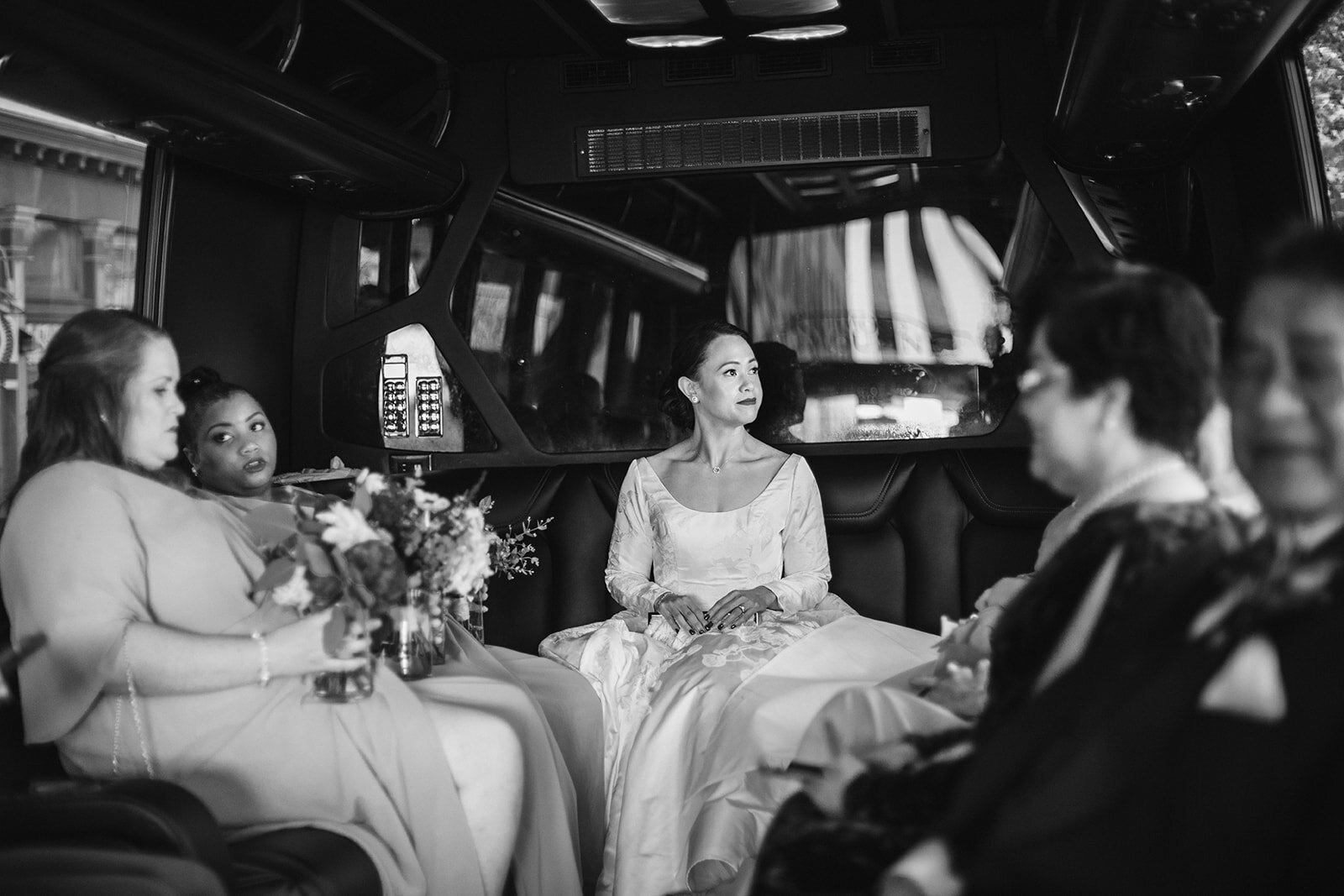  Riding in the limo | Black tie wedding with a red tux and custom Anne Barge gown 