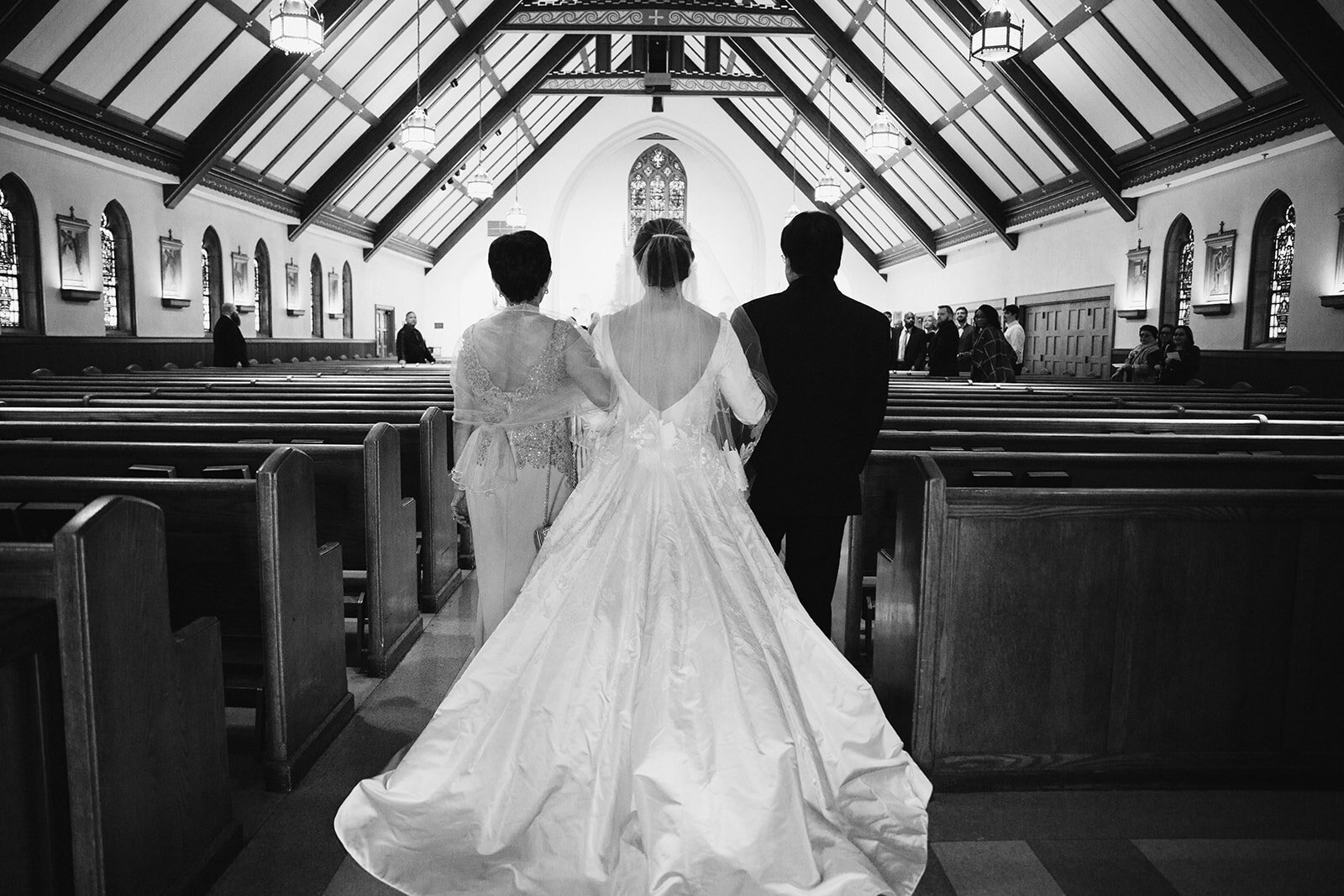 Romantic wedding at St. Bridget Catholic Church, Richmond, VA | Black tie wedding with a red tux and custom Anne Barge gown 