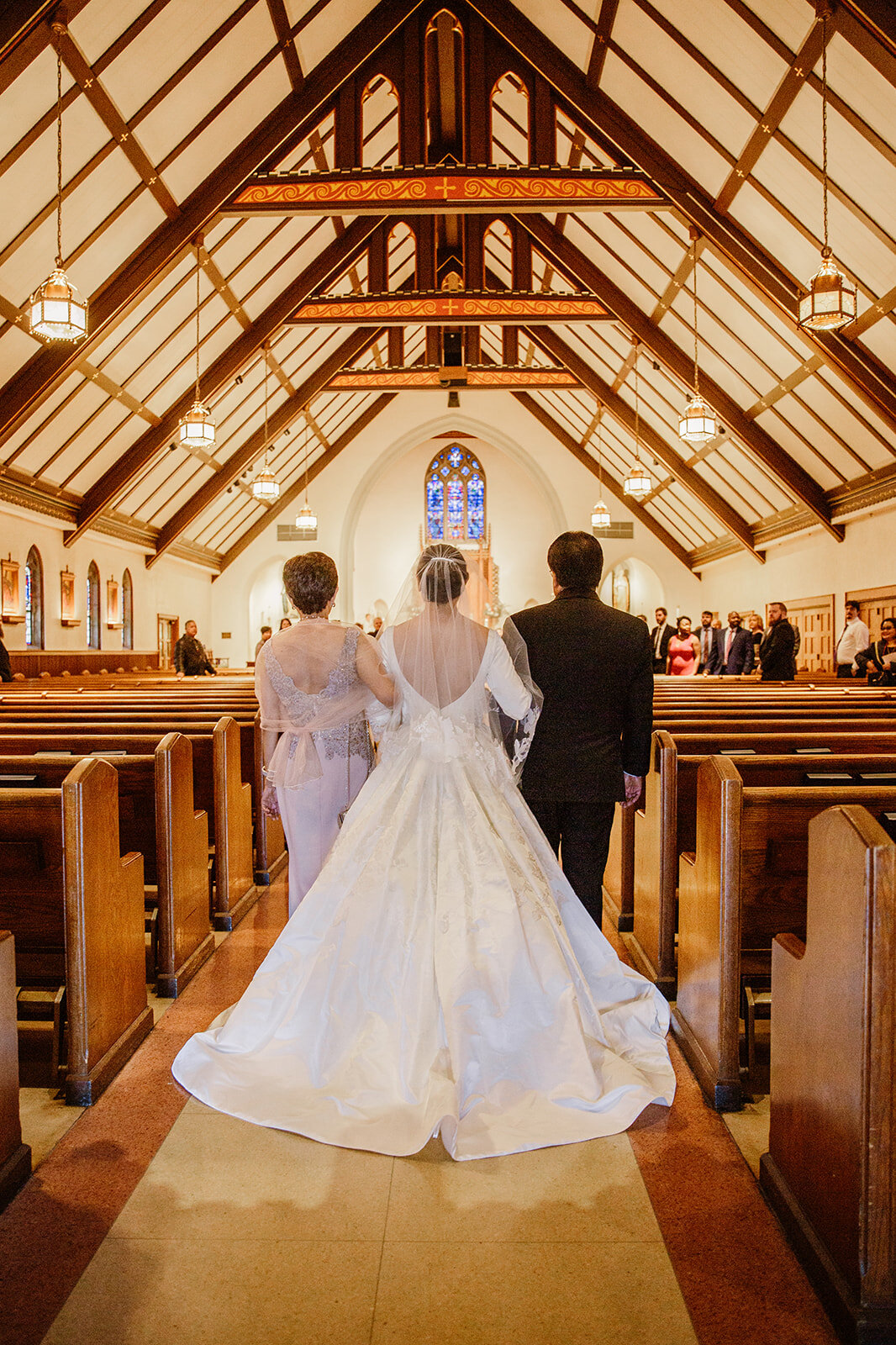 Romantic wedding at St. Bridget Catholic Church, Richmond, VA | Black tie wedding with a red tux and custom Anne Barge gown 
