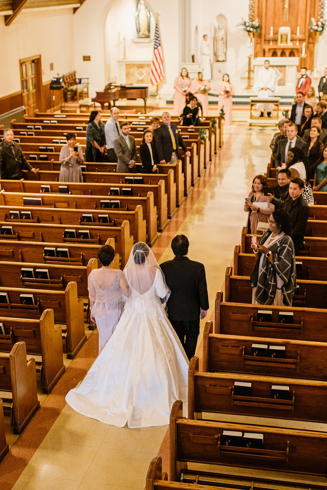 Romantic wedding at St. Bridget Catholic Church, Richmond, VA | Black tie wedding with a red tux and custom Anne Barge gown