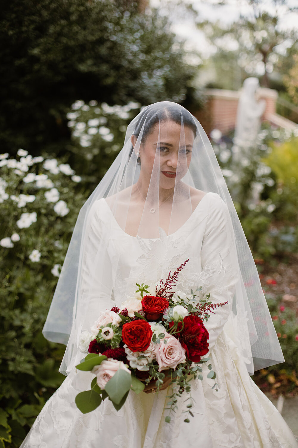 Bride and Groom Portraits | Romantic wedding at St. Bridget Catholic Church, Richmond, VA | Black tie wedding with a red tux and custom Anne Barge gown