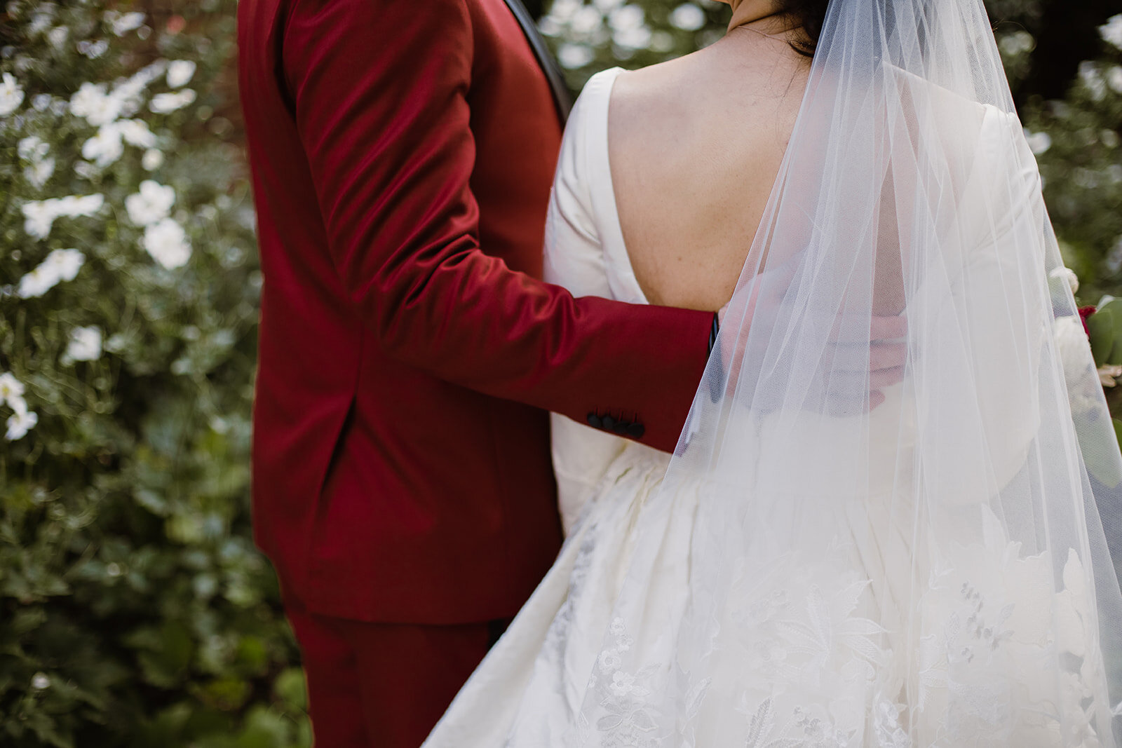  Soft Drop Wedding Veil | Bride and Groom Portraits | Romantic wedding at St. Bridget Catholic Church, Richmond, VA | Black tie wedding with a red tux and custom Anne Barge gown 