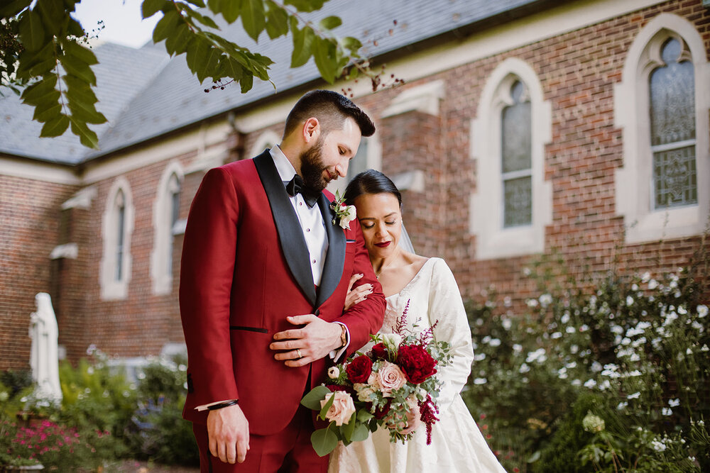  Soft Drop Wedding Veil | Bride and Groom Portraits | Romantic wedding at St. Bridget Catholic Church, Richmond, VA | Black tie wedding with a red tux and custom Anne Barge gown 