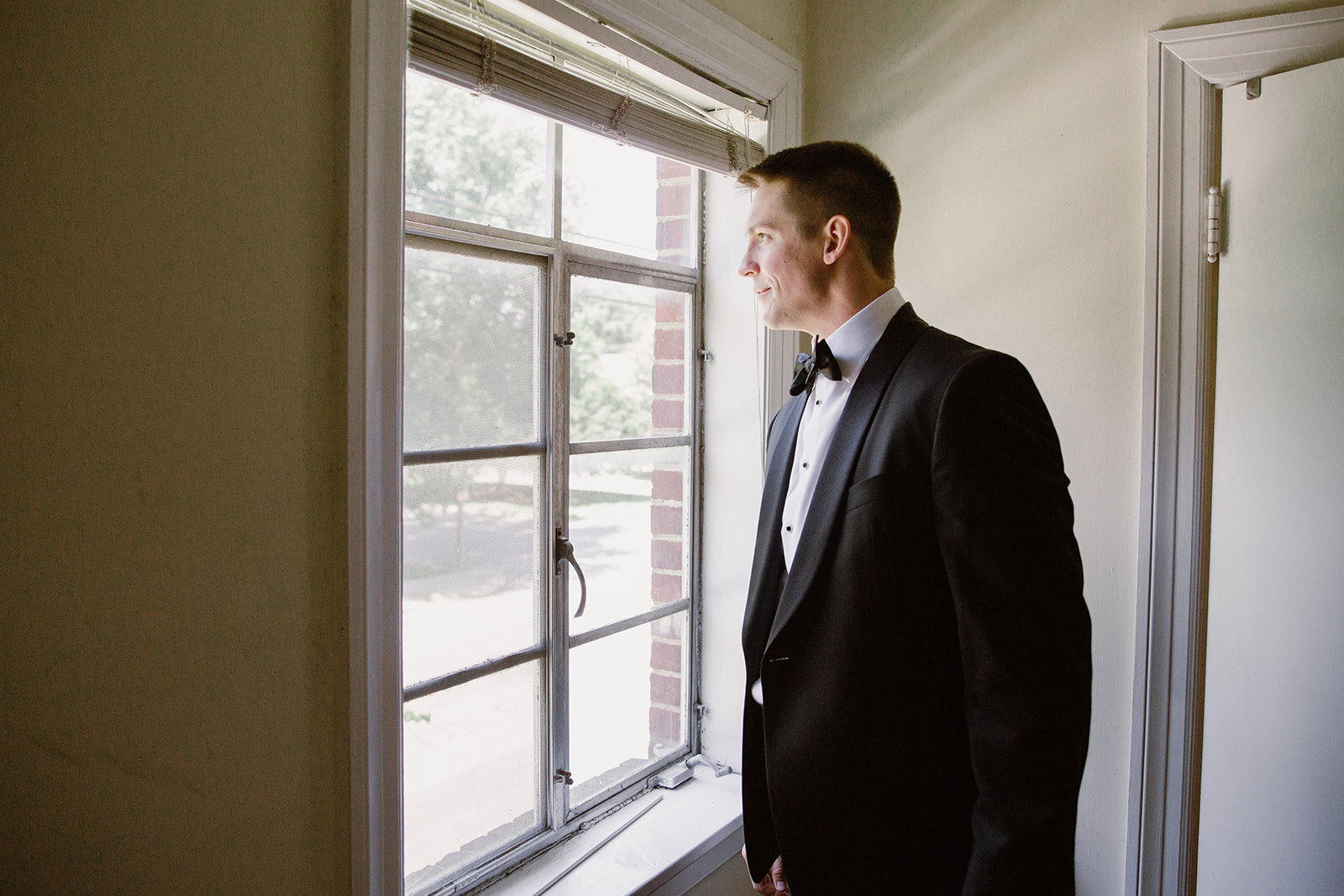 Groom Getting Ready | Sarah Mattozzi Photography | Ball Gown Wedding Dress and Black Tux | Outdoor Classic Wedding at Third Church and Veritas School | Richmond Wedding Photographer 