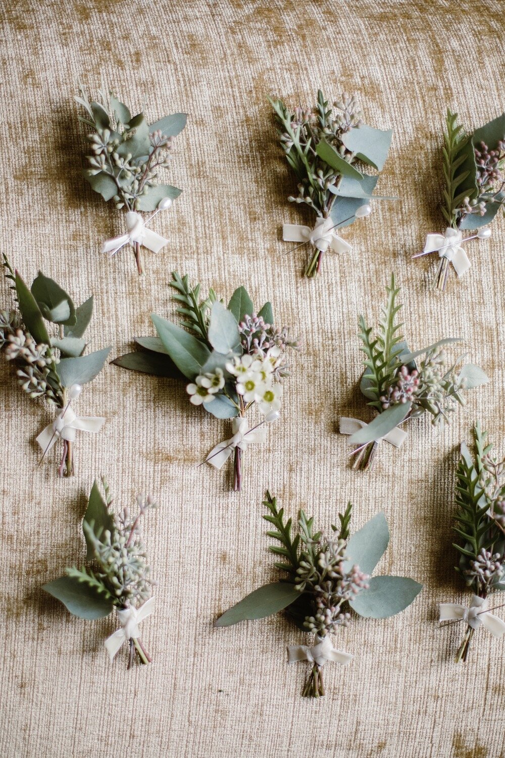  Simple greenery boutonnieres | Sarah Mattozzi Photography | Black tie wedding at The Historic Cavalier Hotel, Virginia Beach | Tropical, elegant wedding inspiration, black tux groom, glam bride, greenery bouquets, sentimental, classic, minimalist we