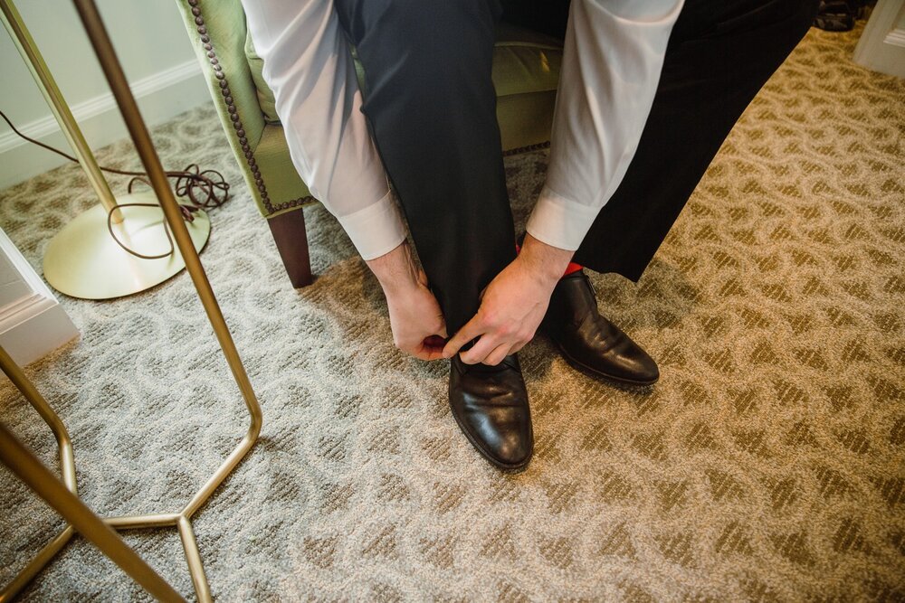  Wedding party getting ready | Sarah Mattozzi Photography | Black tie wedding at The Historic Cavalier Hotel, Virginia Beach | Tropical, elegant wedding inspiration, black tux groom, glam bride, greenery bouquets, sentimental, classic, minimalist wed