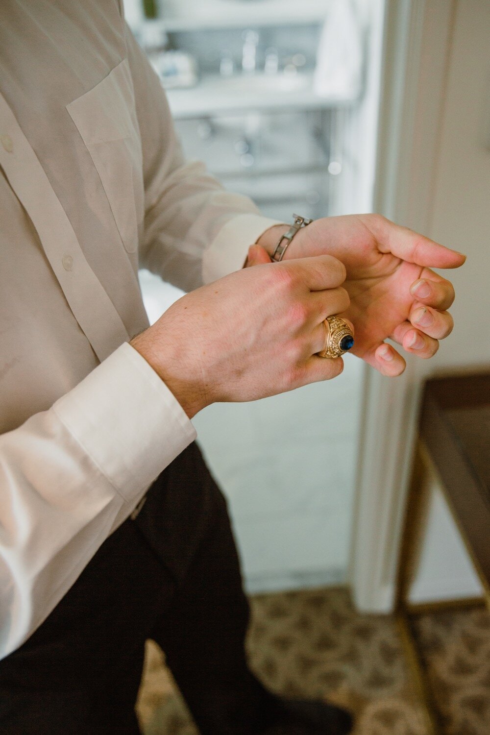  Wedding party getting ready | Sarah Mattozzi Photography | Black tie wedding at The Historic Cavalier Hotel, Virginia Beach | Tropical, elegant wedding inspiration, black tux groom, glam bride, greenery bouquets, sentimental, classic, minimalist wed