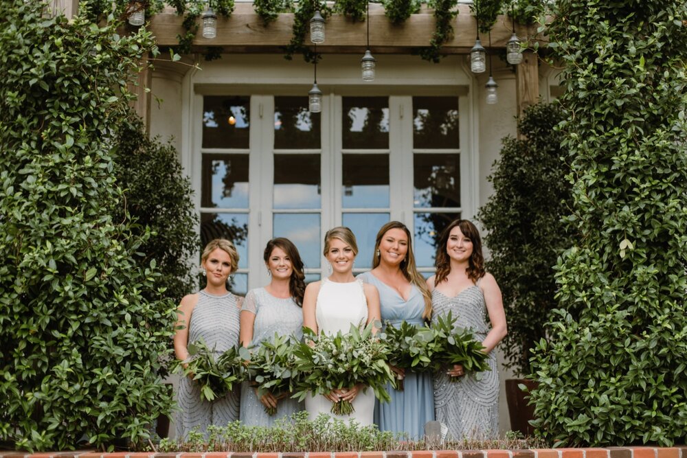  Bridal party wedding portraits | Sarah Mattozzi Photography | Black tie wedding at The Historic Cavalier Hotel, Virginia Beach | Tropical, elegant wedding inspiration, black tux groom, glam bride, greenery bouquets, sentimental, classic, minimalist 